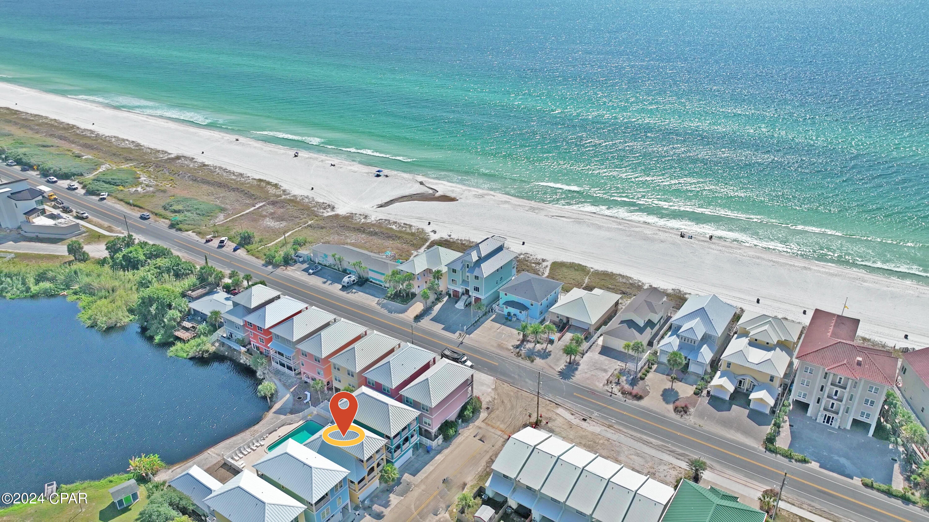 Don't miss out on this exceptional home at 112 Riviera Drive, Panama City Beach, FL 32413. Boasting breathtaking Gulf views, this property provides a serene and inviting vacation retreat while also offering the perfect setting for hosting memorable gatherings. Centrally located on the tranquil West end of Panama City Beach, between the vibrant Pier Park and the scenic 30A corridor, this spacious three-story residence is designed for both relaxation and entertainment. With four generously sized bedrooms, including two luxurious master suites, this home ensures ample privacy and comfort. The large, well-appointed kitchen is ideal for preparing meals and entertaining, and a separate smaller kitchenette on the first floor adds extra convenience. Additionally, the home features 3.5 baths, ensuring plenty of space for everyone. Currently a vacation rental, this property has proven to be a favorite among guests, thanks to its combination of stunning views, spacious living areas, and prime location. Whether you're seeking a peaceful getaway or a vibrant space to entertain, this home is the perfect choice. Great investment opportunity!