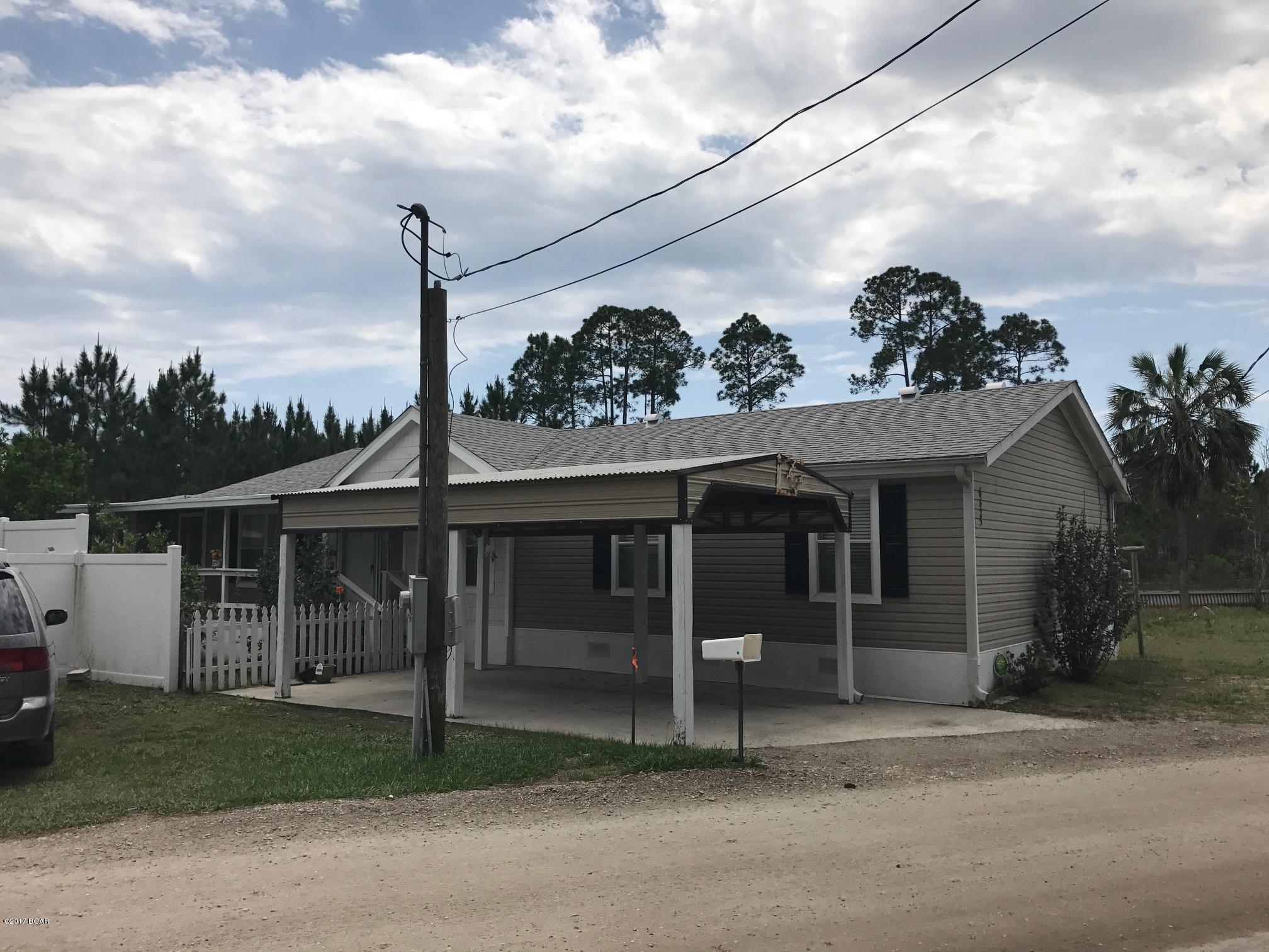 Great 4 bedroom, 2 bath mobile home on a canal leading to St. Andrew's Bay and out to the Gulf of Mexico.  This home features vaulted ceilings, large kitchen with adjoining dining area, split bedroom, and large screened in porch over looking the canal.