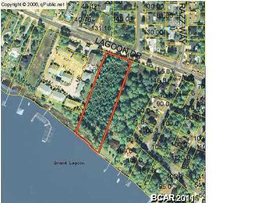 PRICE REDUCED *****EXCEPTIONAL WATERFRONT PARCEL (LAGOON) * ENJOY THE GRAND LAGOON WITH DIRECT ACCESS TO THE GULF OF MEXICO * 2 acres of wonderful land to develop * 190' on the lagoon * possible owner financing with acceptable offer