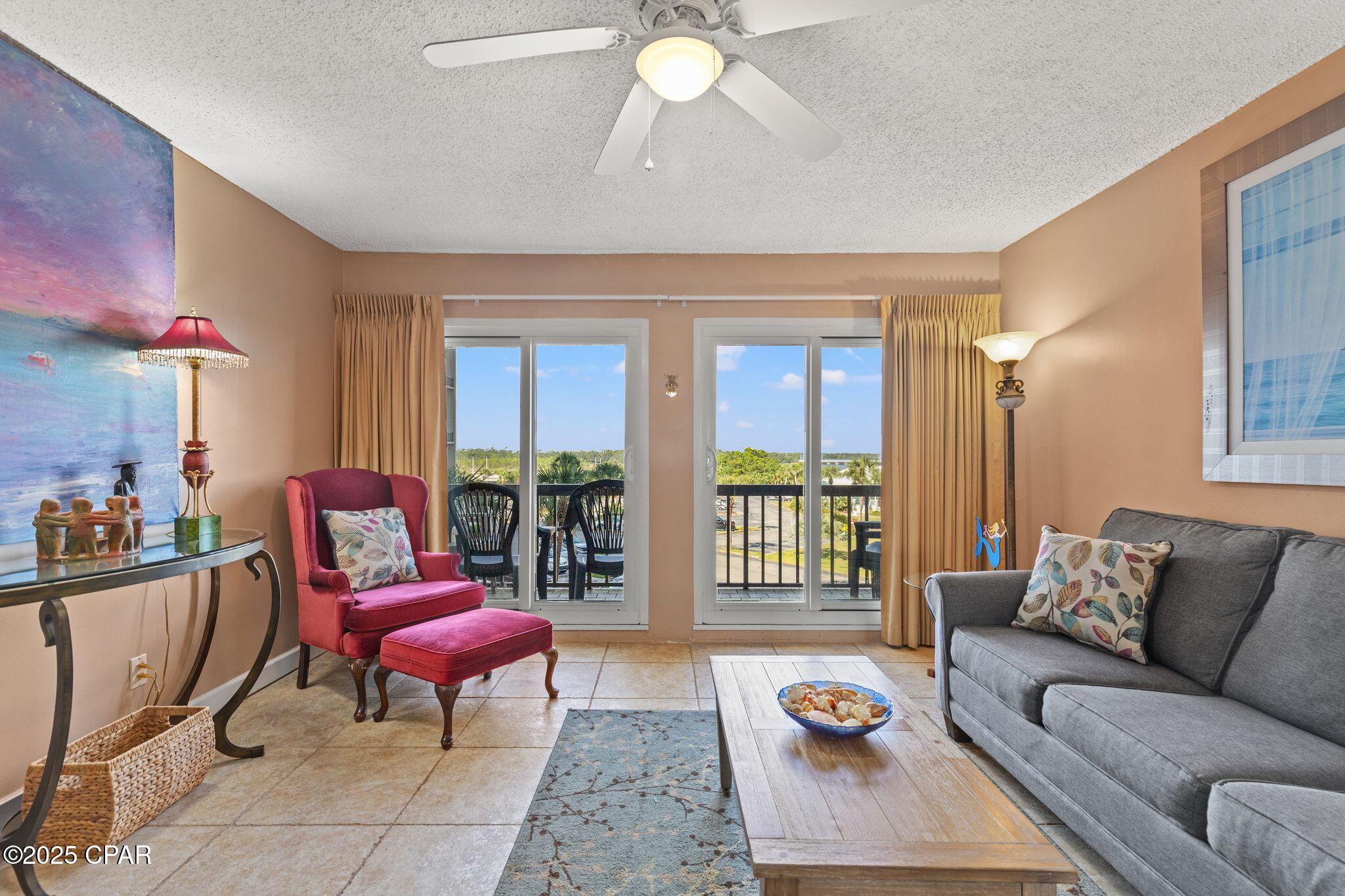 Experience the perfect blend of charm, fun, and artsy atmosphere in this one-bedroom, two-bathroom unit. Enjoy a spacious lakefront balcony accessible from the living room, providing a serene outdoor retreat, while the downstairs bedroom and dining/kitchen areas offer captivating views of the Gulf. 
The large bedroom is located on the first floor and features an ensuite bath for privacy and convenience. This unit can easily function as a two-bedroom space, thanks to the second full bath situated on the second level adjacent to the living room. The living room includes comfortable seating and TV viewing area, allowing for versatile guest accommodations.
The kitchen has been thoughtfully upgraded, providing a modern and functional space for meal preparation. The adjacent dining area offers ample seating and boasts a picture window with beautiful views of the Gulf, making every meal a memorable experience.
Pinnacle Port Resort is nestled on a sprawling 25+ acre site within a picturesque gated community, offering over a quarter mile of pristine beach frontage. Residents and guests enjoy a wealth of amenities, including two swimming pools, tennis courts, a sauna and steam room, a fitness room, and a private freshwater dock complete with boat slips, a boat launch, and complimentary Wi-Fi.