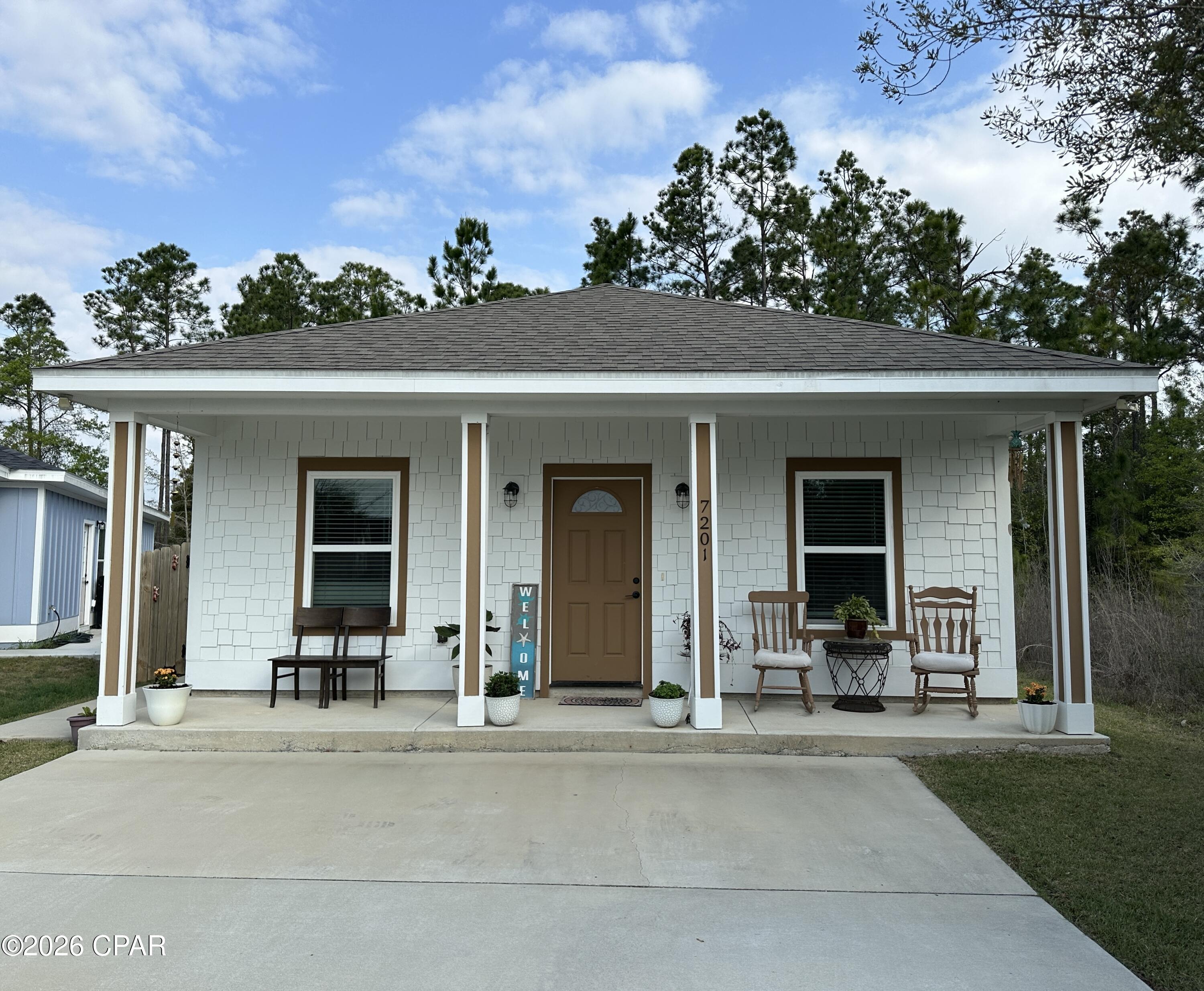 Seller offering up to $3000 towards buyer closing costs! 

This charming home in Sweetwater Village is move-in ready. Settled at the end of a cul-de-sac, and built in 2024, this home is modern, bright, thoughtfully designed and features a clean, open-concept plan. Interior features offer quartz countertops, dimmable lighting throughout, upgraded appliances, dedicated laundry room, plenty of natural light, and a comfortable, convenient layout. The guest bathroom offers a tub/shower combo, while the primary bathroom has a large walk-in shower. 

Exterior features include a cozy front porch, fully fenced yard, matching storage building and spacious outdoor patio. The neighborhood offers a small lake for fishing and kayaking with an adjacent picnic area. 

This quiet escape allows you to enjoy being just 20 minutes from vibrant downtown Panama City, and only 30 minutes from the beautiful Gulf beaches, but still outside the hustle and bustle. Seller is highly motivated!