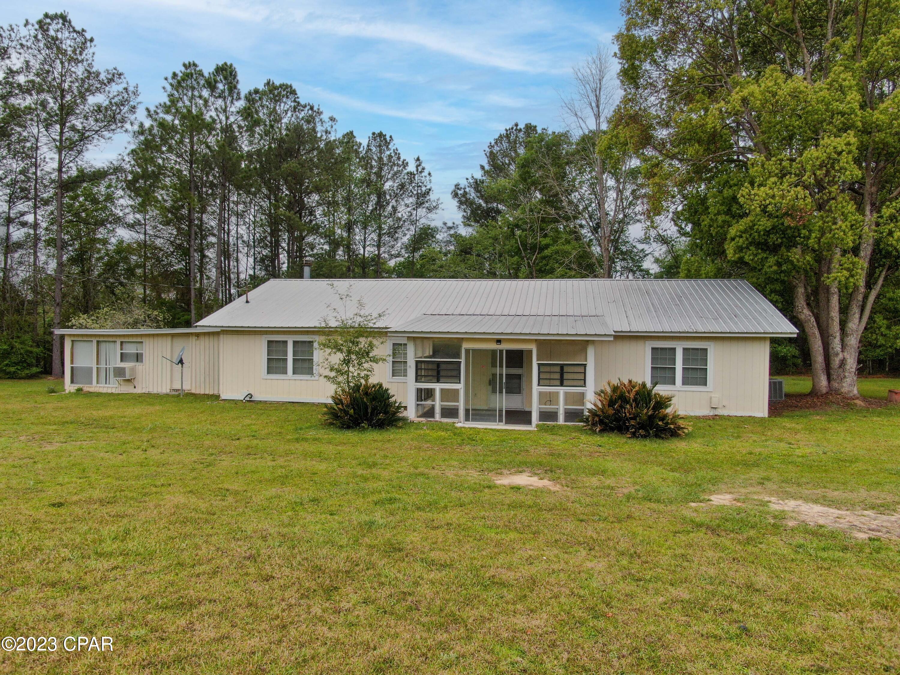 Large home with tons of potential! The owner has already updated the floors with brand new LVP, new stove, new metal roof (installed in 2019). The septic tank was serviced and pumped in 2022 and all windows were replaced in 2019 as well. 



This home has loads of potential with a Florida room and 2nd living room that can be converted into a mother-in-law suite, office space, playroom, etc. 



The property is also over an acre of land with 2 sheds that provide ample amount of space for your toys and equipment.  All this home needs is a little aesthetic updating and you have a true gem on your hands. The home is in great shape and a great home for anyone looking for lots of space!