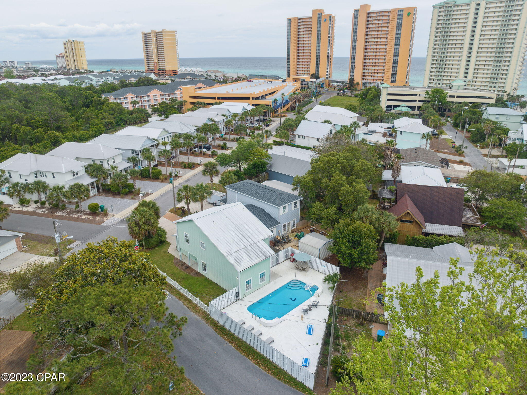 PRIVATE POOL. BEACH ACCESS 74. TURN-KEY RENTAL.
212 Sands Street is a fully furnished vacation rental opportunity on the west end of Panama City Beach, Florida, offering three bedrooms, two-and-a-half bathrooms, multiple sleeping areas, a private pool, a two-car garage, and accommodations for up to 12 guests.
The first floor includes the main living area, a fully equipped kitchen, a half bathroom, and an additional sleeping area. The kitchen is stocked with appliances, cookware, glassware, utensils, and dining essentials, creating a turn-key setup for continued rental use. Upstairs, the home features three bedrooms and two full bathrooms.
Outside, the large backyard includes a private pool, cool-deck patio space, and room for outdoor seating and lounge chairs. The driveway and two-car garage provide ample parking for multiple vehicles.
Beach Access 74 is located just down the golf-cart-friendly road, with access to the Gulf between the two Splash Resort towers. The property is approximately 1.6 miles west of Highway 79, with convenient access to Northwest Florida Beaches International Airport, Pier Park, restaurants, shopping, and the communities along Scenic Highway 30A.
The property is being sold fully furnished and turn-key.
All information is deemed reliable but not guaranteed; buyer to verify if important.
Seller has directed that subject-to, owner-financing, mirror-wrap, and wraparound mortgage offers will not be considered.