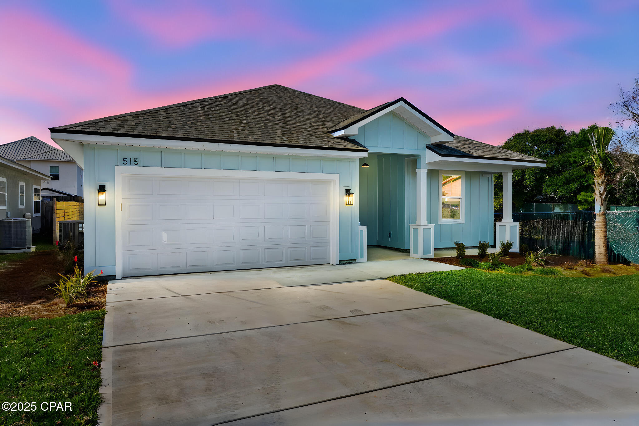 Just completed in 2025, 515 Pine Tree Drive brings fresh coastal living to Panama City Beach with 4 bedrooms, 2 bathrooms, and 1,750 sq ft of thoughtfully designed space, ready for full-time living, a vacation retreat, or a high-performing short-term rental.
Step inside and the details speak for themselves: soaring 8' interior doors, wide-plank flooring throughout the open-concept layout, and recessed lighting that keeps every room feeling bright and airy. The living spaces flow naturally together, making it easy to settle in or set up for guests.
At the heart of the home, the kitchen is designed to impress, anchored by a generous quartz island and dressed in two-tone cabinetry with white uppers and rich navy lowers. Stainless steel appliances, a modern tile backsplash, and statement pendant lighting round out a space that's as functional as it is stylish. Both bathrooms carry the same elevated finish level, featuring quartz countertops, designer fixtures, and a spa-inspired walk-in shower with frameless glass enclosure.
Step outside to a covered patio and a fully privacy-fenced backyard, an ideal setup for outdoor dining or pets. Located in an STR-friendly corridor just minutes from everything that makes Panama City Beach a top destination, this brand-new build offers the rare combination of zero deferred maintenance and true move-in-ready appeal.