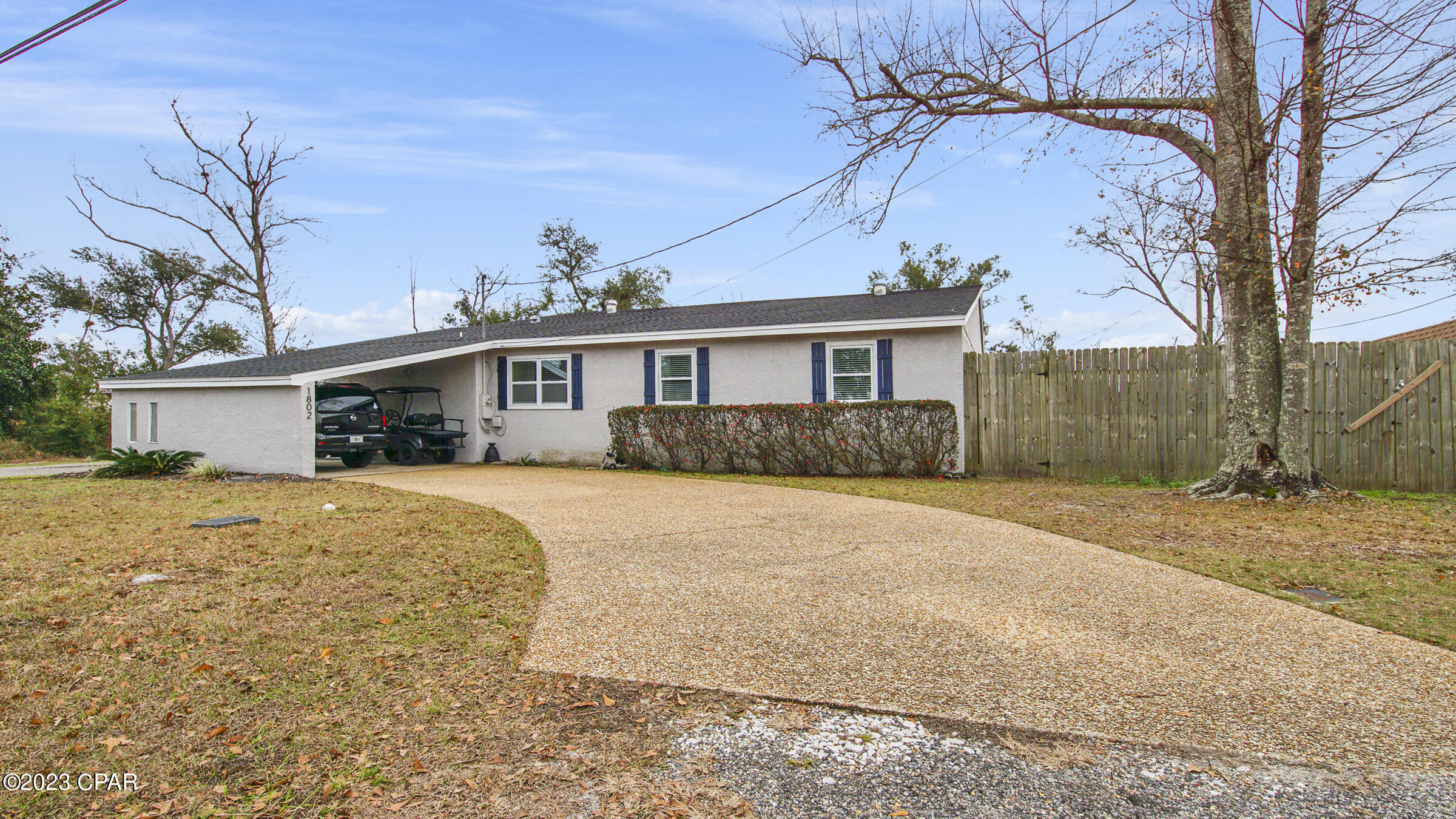 This awesome home sits right in the heart of Lynn Haven.  It offers spacious, open concept living with luxury vinyl wood plank flooring & beautifully upgraded finishes throughout. Enter through the vast mudroom then open the door entering the open living, kitchen & dining space. To the left, you'll notice a separate primary bedroom with two closets & a conjoining bathroom. This split floor plan allows your guest to have their privacy but still stay in the action! Down the hall you'll find a hall bath, the true owner's suite & two more cozy bedrooms. Outside, you'll find a cozy outdoor space with a POOL! Dog friendly, no cats.