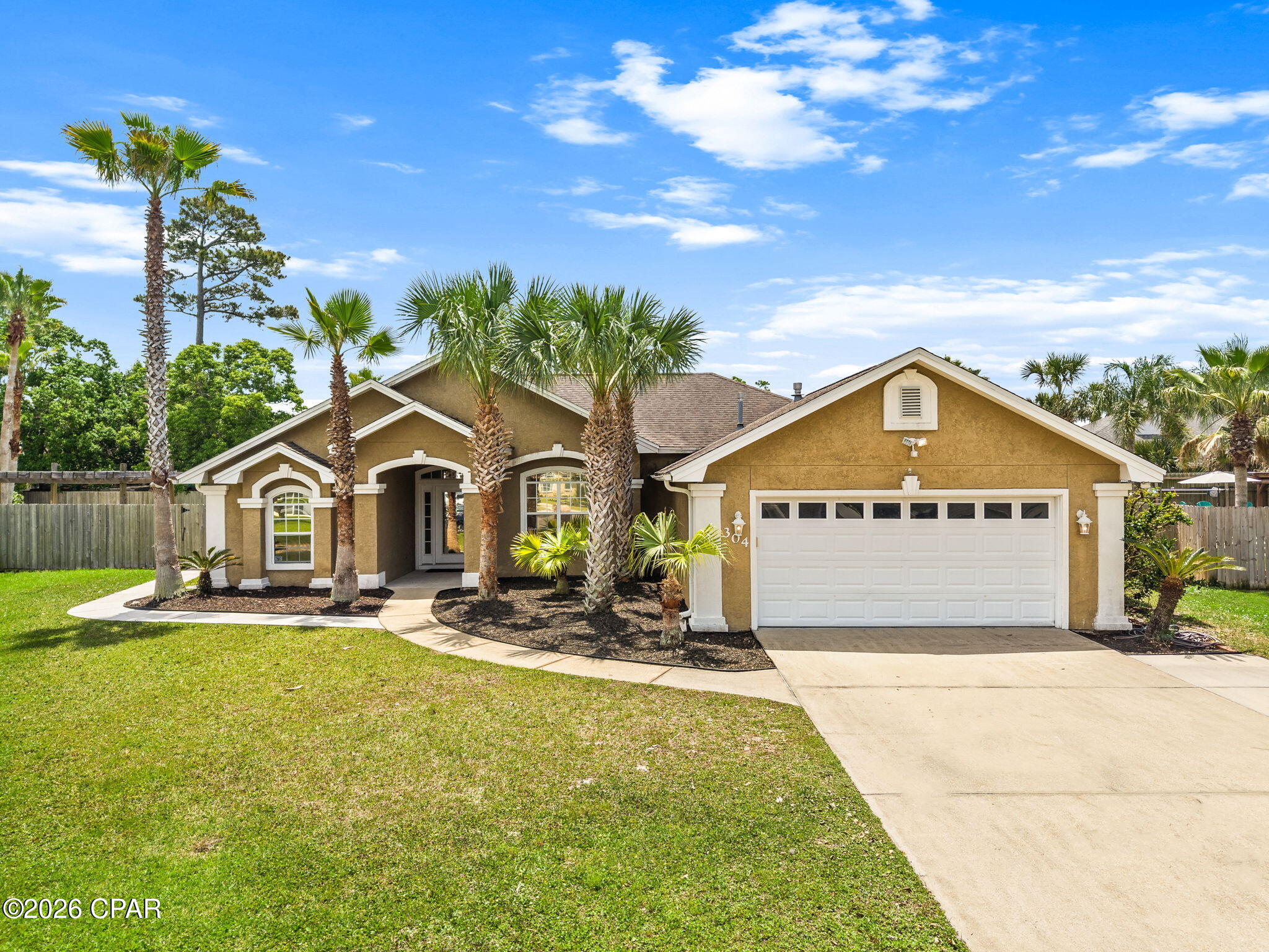 'CURRENTLY UNDER CONTRACT, SELLER WILL CONSIDER BACKUP OFFERS' 
Welcome to your own slice of paradise in Panama City Beach! Nestled on a quiet cul-de-sac with no HOA, this 3-bedroom, 2-bathroom home offers the perfect combination of comfort, functionality, and coastal living with endless potential to make it your own. From the moment you step inside, you'll appreciate the warmth and character of the solid hardwood cherry floors that flow throughout the main living areas, creating an inviting and timeless feel. The inviting living room is anchored by a cozy gas fireplace, creating the perfect focal point for relaxing evenings and adding charm to the home's atmosphere.
Designed with a desirable split floor plan, this home offers privacy and flexibility for a variety of lifestyles. The spacious primary suite is truly a retreat of its own, featuring enough room for a nursery, home office, sitting area, or workout space. The ensuite bathroom offers a large walk-in closet, separate shower, and a relaxing corner jetted tub perfect for unwinding after a long day.
On the opposite side of the home, you'll find two additional bedrooms ideal for guest rooms, children's rooms, a home gym, hobby space, or additional office space. The open and functional layout provides comfortable everyday living while still offering excellent entertaining potential.
One of the standout features of this property is the additional heated and cooled Florida room complete with its own mini-split unit, creating a versatile bonus space that can be enjoyed year-round. Whether used as a second living area, game room, sunroom, or entertaining space, it adds valuable square footage and flexibility to the home.
Step outside to discover your private backyard oasis featuring an in-ground pool and privacy-fenced yard, creating the perfect setting for relaxing, entertaining, grilling, or enjoying the Florida sunshine. The spacious backyard offers both comfort and seclusion while still being conveniently located close to everything Panama City Beach has to offer. Mature landscaping and the home's established setting provide an excellent canvas for someone looking to personalize and enhance the property over time.
The 2-car garages an epoxy floor. With no HOA restrictions, a cul-de-sac location, and plenty of indoor and outdoor living space, this property is an exceptional opportunity for those seeking full-time living, a second home, or an investment near the beach.
Conveniently located near shopping, dining, entertainment, schools, and the world-famous white sandy beaches of Panama City Beach, this home combines privacy, functionality, and coastal charm all in one package.
