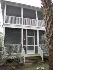 Barefoot Cottages - Bayside living in a gated community with turn key living at its best at a great price. Two pools, hot tub, playgrounds, grilling areas, community center with exercise equipment, grounds keeping and much more. Unit is complete with all appliances including washer and dryer, hardwood floors downstairs and ready to go. Each bedroom has an en suite private bath and the upstairs master has its own screened in porch/balcony. You'll also enjoy the screened in porch downstairs off the living area. All dimensions taken from the Gulf County Property Appraiser's website and deemed reliable. **Buyer Rebate up to $2,000 on this unit. Some restrictions may apply**