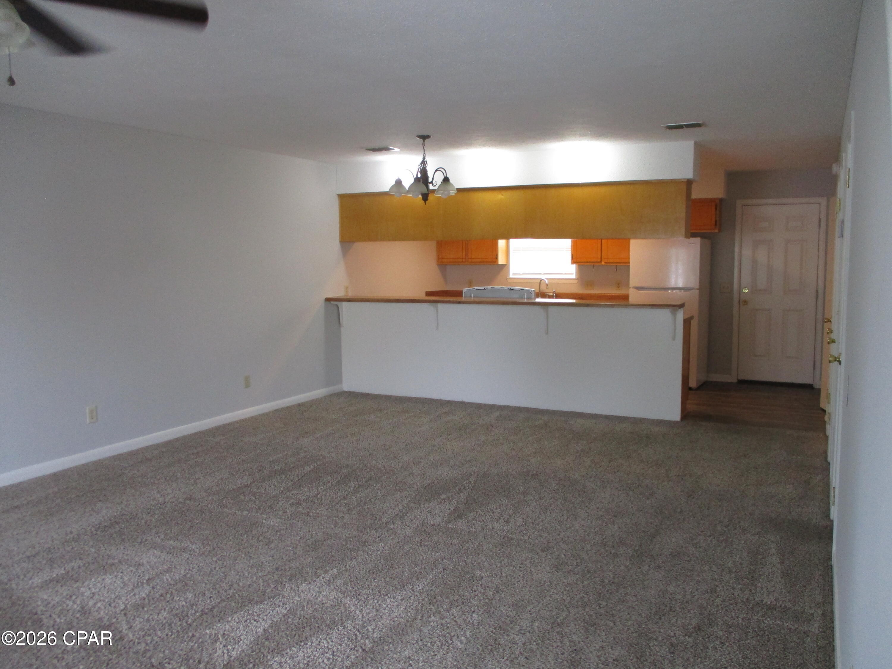 Centrally located to all amenities and shopping venues on 23rd and 15th Streets.  All room sizes are approximate.  Very nice end unit with large open living/dining area.  All major appliances, handy outside lock storage on patio., and washer/dryer closet.  Washer/Dryer not included. Master bedroom has its own bathroom.  

$50  application fee - immediate occupancy after application and approval & lease signed.