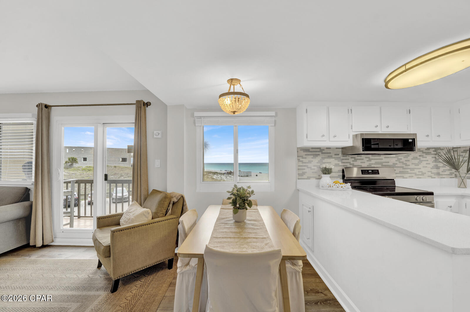 Experience elevated coastal living in this beautifully updated 2-bedroom tower residence at Pinnacle Port. Perfectly positioned to capture sweeping views of the Gulf and surrounding coastal landscape, this unit offers the ideal blend of privacy, scenery, and resort-style convenience in one of the area's most sought-after gated communities.

Located in the tower, this condo provides a more elevated perspective--filling the space with natural light and offering breathtaking sunrise and sunset views from your private balcony. Inside, the open-concept layout creates a seamless flow between the living, dining, and kitchen areas, making it perfect for both relaxing and entertaining. The kitchen features modern updates, sleek appliances, and ample storage, while both bedrooms offer comfortable retreats with updated finishes and coastal-inspired design.

Pinnacle Port is renowned for its unique low-density feel and exceptional amenities, including two pools, direct beach access, tennis and pickleball courts, a fitness center, boat launch with access to Lake Powell, and 24-hour gated security. Tucked along a quiet stretch of Panama City Beach, yet just minutes from the dining, shopping, and charm of 30A, this location offers the best of both worlds.

Whether you're seeking a full-time residence, second home, or income-producing investment, this 2-bedroom tower unit delivers stunning views, strong rental potential, and the ultimate coastal lifestyle at Pinnacle Port.