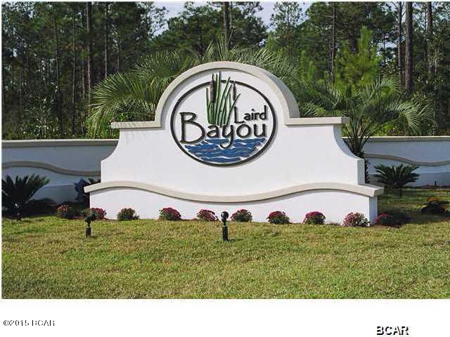 Waterfront Lot in Exclusive Gated Community. If you are looking to build a custom home, Laird Bayou is the hidden jewel to do so. Amenities include private pool, boat launch and dock, cabana, gated boat and RV storage. Low annual HOA. Access to the Gulf and Intercostal Waterway.