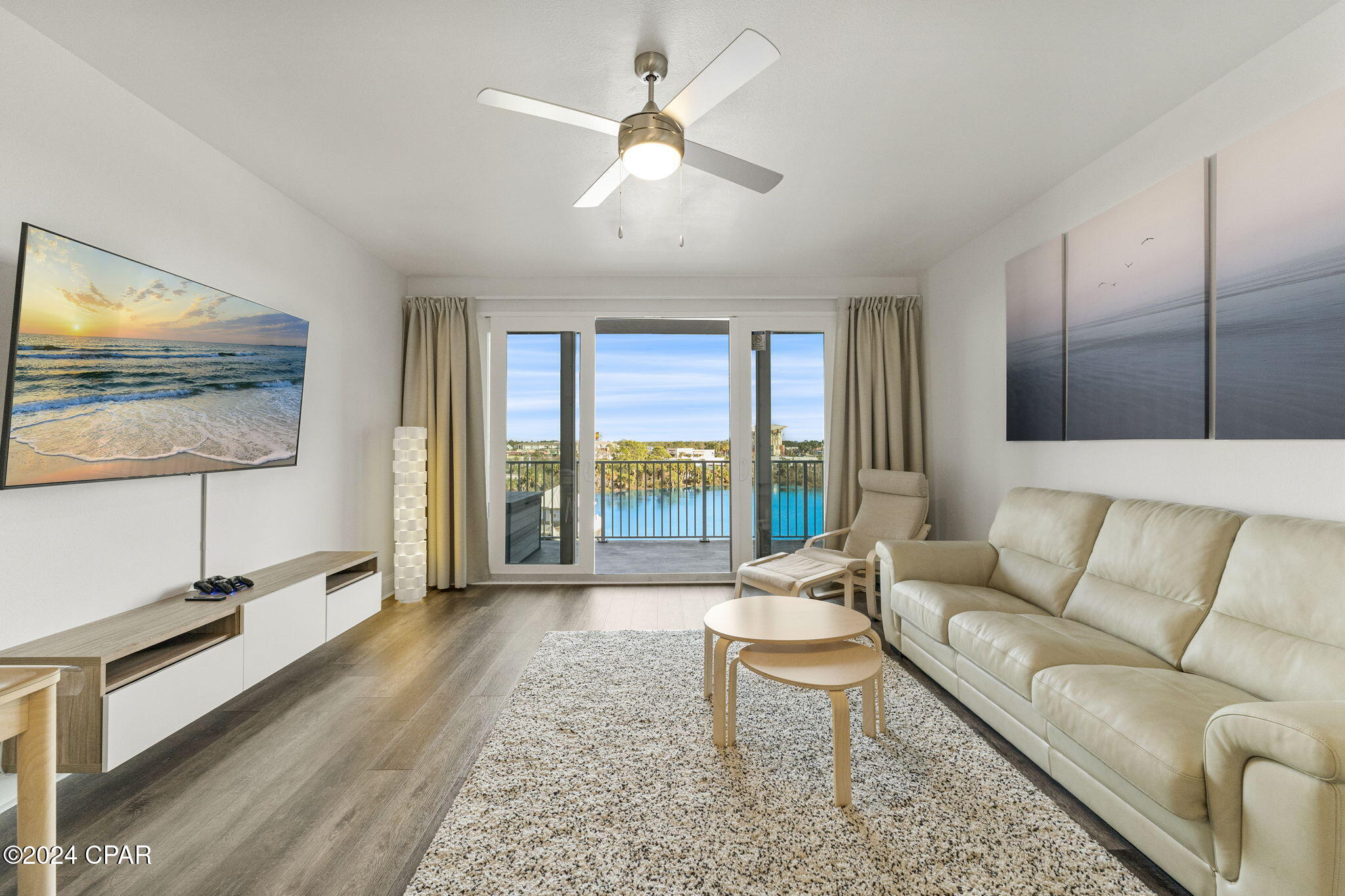 Welcome to Laketown Wharf 309 - one of the nicest units in the entire building! Totally updated, tastefully decorated and fully furnished 2Bd/ 2Ba + bunk room 1,262 Sq. Ft. condo. Perfectly situated on the 3rd floor - no need to wait for the elevator! Recently transformed with over $100k renovation, modern interior features an open-concept layout with new flooring, fresh paint, upgraded lighting package, and a gourmet kitchen equipped with stainless steel appliances, quartz countertops, and shaker-style soft-close cabinetry, a spacious living area with brand new furniture and decor. Stay comfortable year-round with a brand-new 3-ton HVAC custom made system, ensuring efficient heating and cooling throughout the condo (most similar  floor plan units are using to 2-2.5 ton that takes longer to cool down) and dehumidifier. Liquid and water sensors located in all five areas, underneath every sink, HVAC closet and laundry room for additional protection. Step outside to the spacious private balcony where you can enjoy scenic views of the lake and daily fountain shows. This is the perfect time to invest in the complex, as Laketown Wharf has recently added the exciting ''810 Billiards and Bowling,'' a family-friendly venue that will significantly enhance the resort's appeal and increase rental potential. Resort amenities include 5 pools (one heated), 2 hot tubs, a private beach access, multiple on-site dining, a gulf view fitness center, ice cream shop, hair salon, playground, multiple elevators, two covered parking garages, boardwalk overlooking lake, doggie area and more. This condo is ideal as a primary residence, vacation home or investment property. Call now for your private and exclusive showing!