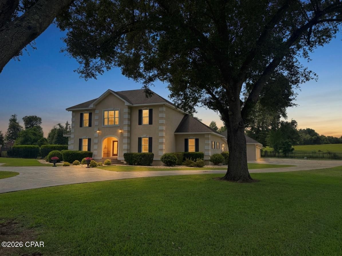 Nestled beneath a canopy of majestic Live Oaks in the highly desirable Forrest Park subdivision, this exceptional custom home offers timeless curb appeal from the moment you arrive. A graceful circular driveway welcomes you home, setting the stage for the incredible space, thoughtful design, and unmatched functionality that await inside.

Boasting 4 bedrooms and 3.5 bathrooms, this home was designed with both everyday living and entertaining in mind. Upstairs, you'll find a spacious secondary living area perfectly situated between two oversized bedrooms, each featuring its own private ensuite bath--an ideal retreat for guests, or children.

One of the home's most impressive features is the approximately 1,000-square-foot addition overlooking the sparkling swimming pool. This incredible flex space serves as the ultimate game room and entertainment area, complete with its own kitchen, generous living area, and seamless access to the backyard oasis.

Storage is simply unmatched throughout the home. You'll appreciate the oversized custom mudroom, three separate kitchen pantries, a dedicated bill-pay/workstation, an elegant butler's pantry connecting the dining and living rooms, and even a massive luggage closet--thoughtful details that make everyday life effortlessly organized.

The beautifully updated kitchen showcases upgraded cabinetry, premium countertops, and abundant workspace, while fresh interior paint and updated flooring create a bright, move-in-ready feel throughout. An attached four-bay garage offers exceptional space for vehicles, hobbies, and storage.

Step outside to your own private resort where a sparkling pool, expansive backyard, covered lanai, and convenient outdoor shower create the perfect setting for relaxing weekends, family gatherings, and unforgettable summer evenings.

Combining stunning architectural presence, incredible entertaining spaces, abundant storage, and a premier Forrest Park location, this is a rare opportunity to own a home that truly has room for everyone--and everything.