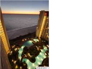 Ever wanted something, but it was not available? Well, here's your opportunity to own in the most popular resort on Panama City Beach. This 6th floor, professionally decorated 1BR with bunk unit is centrally located with stellar views of those gulf sunsets while overlooking the $3 million lagoon pool and its lush tropical landscaping. Some of the many features are a pool side tiki bar, grille, a large indoor heated pool, spa, sauna and steam room, fitness center and high speed internet access. This unit is a must-see to really appreciate the beauty! The modern architecture and elegance will attract even the most discriminate buyer to this high class resort! The double balcony is spacious enough to host dinner with friends while watching the dolphins play. Association fees, square