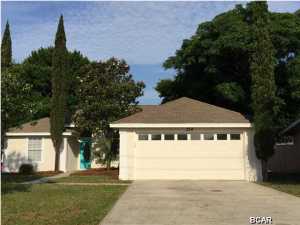 Short walk to the beach and 1/2 mile to Pier Park! This home has a brand new air conditioner, granite countertops, stainless appliances, new carpet and much more... Hot water heater in 2013. The covered patio opens to the large fenced yard. This home even boasts a 2 car garage. Terrific kitchen and very livable open floor plan. Ready for you to unpack, move in and enjoy being close to the beach, shopping and parks.