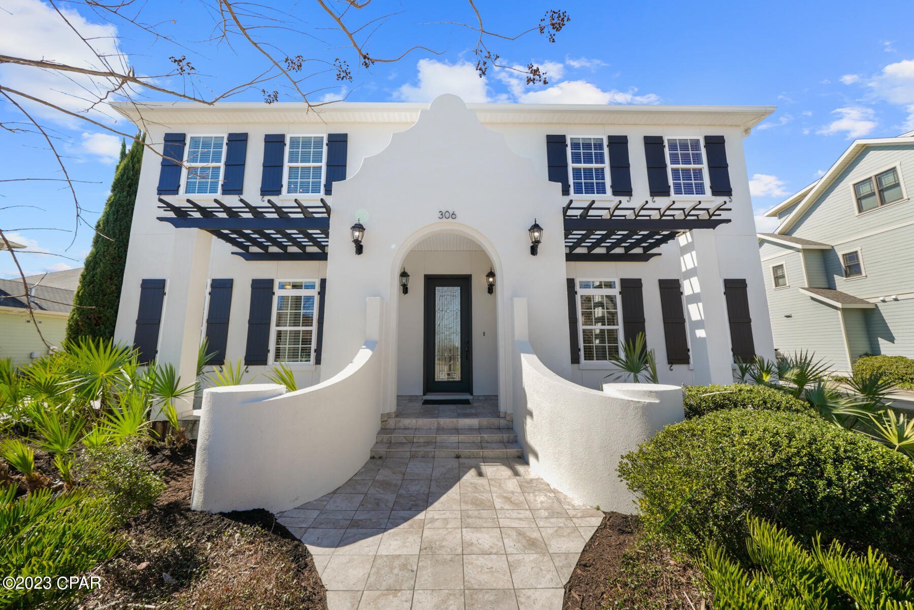 Stunning home for sale in the centrally located, upscale Tapestry Park neighborhood in Panama City Beach, FL.

A total of 3370 sq feet heated and cooled at your disposal, which includes a spacious above the garage apartment with full bath, bedroom, full kitchen, laundry and living room. This apartment has a separate entrance from the main house and can be used for a nanny, in-laws, or even as a long term rental option.

The main house has 3 bedroom/ 2.5 bathrooms, with beautiful interior accents, and a well thought out floor plan. An executive office is located on the lower level, with built-in workspaces. There is also a full house Fantech ventilation system that provides timed fresh air exchanges throughout. 

The outdoor living area consists of a large covered porch and has a 17 x 30 ft heated saltwater pool with sun shelf, and a 9 foot custom overflow spa outfitted with a pergola above. The pool is surrounded by shady palm trees, and a full shell stone travertine pool deck. This thoughtfully designed space comes with an outdoor granite kitchen with ice chest, fridge, grill, sink and large power burner. There is a full outdoor bathroom for your convenience, as well as an outdoor shower. 

-Saltwater pool was built in 2019. Pool and spa are heated with natural gas and are fully automated via the Pentair app.

-New exterior elastomeric paint

-Owners have building plans which convert one bedroom upstairs into a flex room that attaches the apartment to the main house and moves the laundry upstairs. In the apartment it would change to an efficiency style 1 bedroom with a small kitchen that remains separate from the main house with its own entrance. And the current apartment living room would become an ensuite bedroom that attaches to the main house. 
HOA fees include premium cable HBO/advanced internet and trash service.