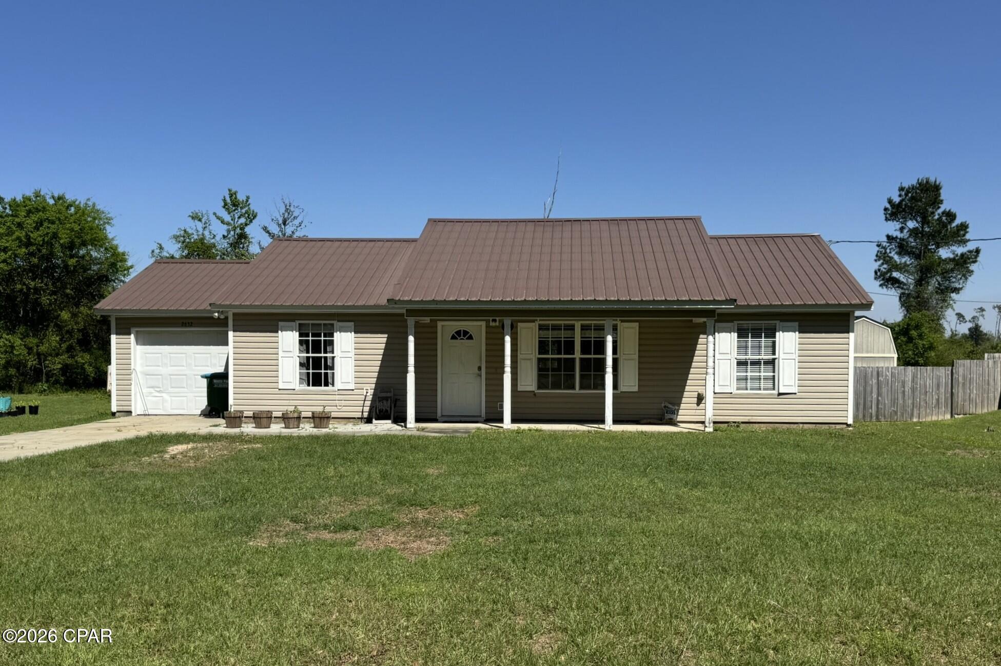 Welcome home to peaceful country living with the convenience of town just minutes away! This solid stick-built 3 bedroom, 2 bathroom home sits on .34 acres in a quiet, one-way-in, one-way-out subdivision--perfect for low traffic and added privacy.
Located just half a mile from Interstate 10, you'll have quick access for commuting while still being close to all the shopping, dining, and everyday essentials in Marianna.
This home is packed with value and upgrades, including a metal roof, solar panels for energy efficiency, and a new smart water heater. Step outside to a fully fenced backyard, ideal for kids, pets, or entertaining, plus a spacious 36x24 pole barn for storage, hobbies, or workspace.
Inside, you'll find a functional layout with a breakfast bar perfect for casual meals or gathering with family, along with an attached garage for added convenience.
The property is on city water with a septic system that was just pumped last month, giving you peace of mind moving in.
If you've been looking for a well-built home with space, privacy, and easy access to everything--this one checks all the boxes.
Don't miss it--schedule your showing today!