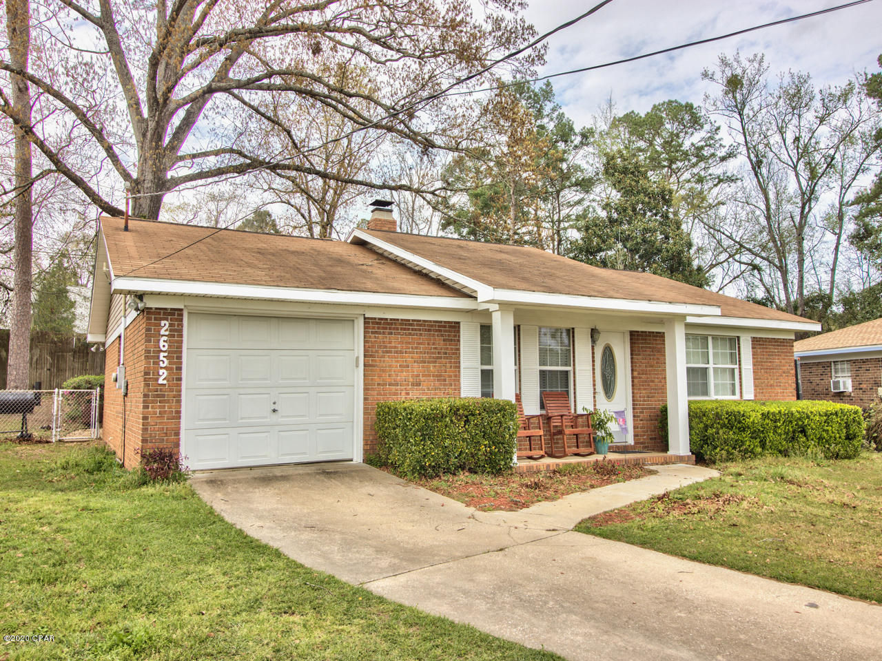 Eastgate brick home beauty. This home has 3 bedrooms and 2 bathrooms. Very large living room with cozy brick   wood burning fireplace.  Large kitchen with clean white cabinets opens to big dining space and sliding doors to lush, fully-fenced backyard centered with a  huge grandfather oak tree for shade. The back yard also has a walk-in shed for extra storage. Master suite has two closets and an updated bathroom with walk in shower. Sizable hall bathroom which is also nicely updated. IF YOU ARE LOOKING FOR A HOME FOR UNDER $200,000 IN N/E TALLAHASSEE THIS HOME IS A MUST TO SEE. Well maintained and great yard and neighborhood. This neighborhood has won neighborhood of the year several times. So close to restaurants, shopping, and the I-10 corridor. This one won't last long.