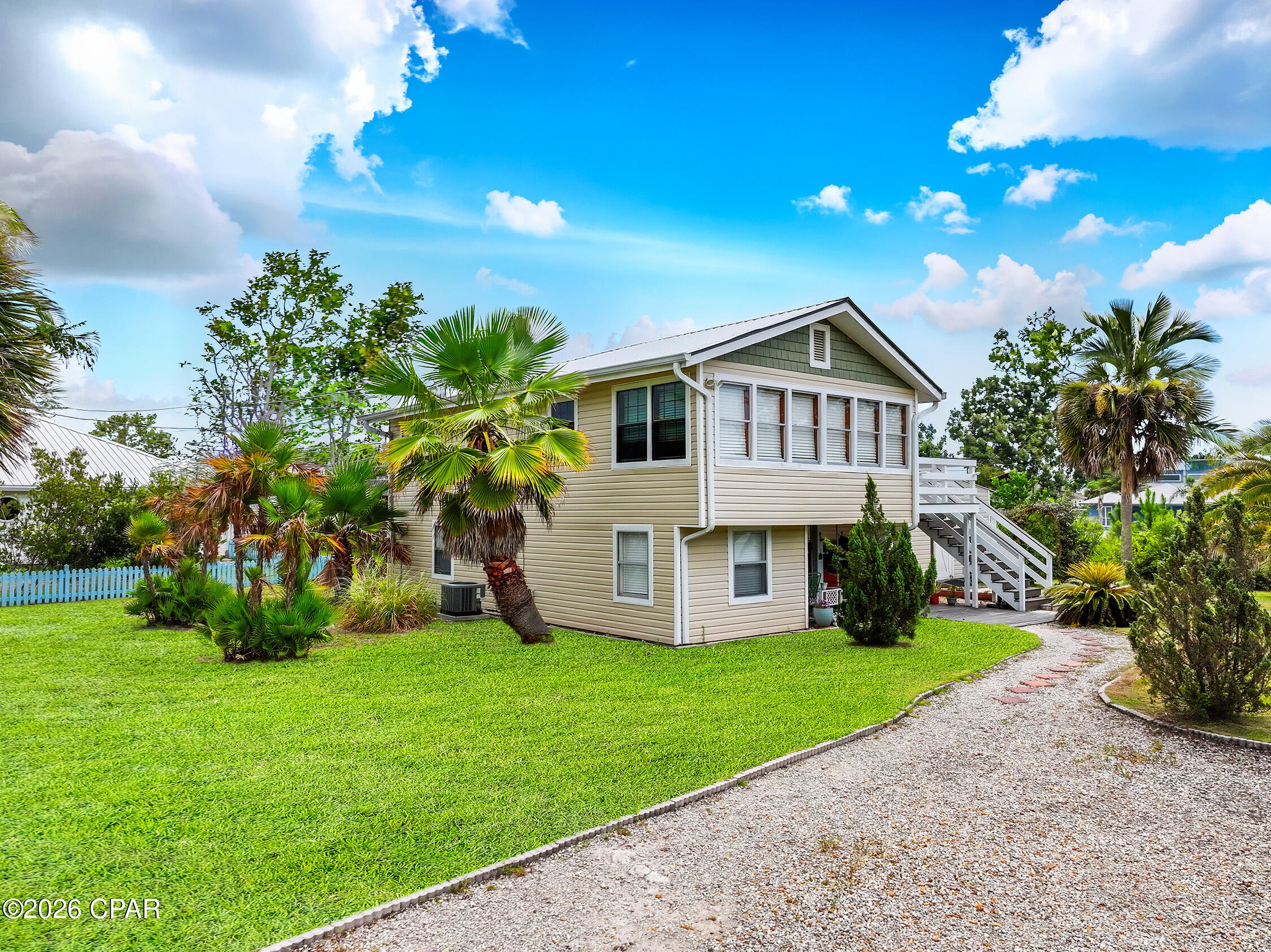 TWO FOR THE PRICE OF ONE! This property is equal parts investment and enjoyment. 

Welcome to 412 California Avenue--a rare opportunity in the heart of Mexico Beach offering two completely separate living spaces under one roof. Whether you're looking for a primary residence with rental income, a beach retreat for extended family, or an investment property with short or long-term rental potential, this one checks all the boxes.

A local vacation rental management company conservatively estimates average annual gross rental income at approximately $15,000 for the combined units. On the long-term rental market, each unit can command approximately $1,400/month. 

Located in desirable Flood Zone X--where flood insurance is not typically required by lenders--this home features a fully equipped upper residence with an open-concept living area, kitchen, spacious bedroom, full bath and soaring wood-accented ceilings that create a warm coastal retreat.

The lower level is completely independent with its own private entrance, kitchenette, living area, bedroom and full bath, making it ideal for guests, multi-generational living or generating rental income while maintaining privacy for everyone.

Outside, the Mexico Beach lifestyle truly comes to life. Start your mornings with coffee on the expansive upper deck, spend afternoons relaxing beneath the covered patio, and enjoy the beautifully landscaped yard filled with mature palms and plenty of room to entertain. 

The detached shed/workshop provides exceptional storage for beach gear, fishing equipment and all the toys that come with living at the beach.
Best of all, you're just a short golf cart ride or bike ride from Mexico Beach's sugar-white sand, Gulf waters, locally owned restaurants, marina, parks and unforgettable sunsets.

Being sold mostly furnished, this is a turnkey opportunity to begin enjoying the Forgotten Coast lifestyle from day one--whether you're moving in full-time, creating a family beach getaway or adding a versatile income-producing property to your portfolio.