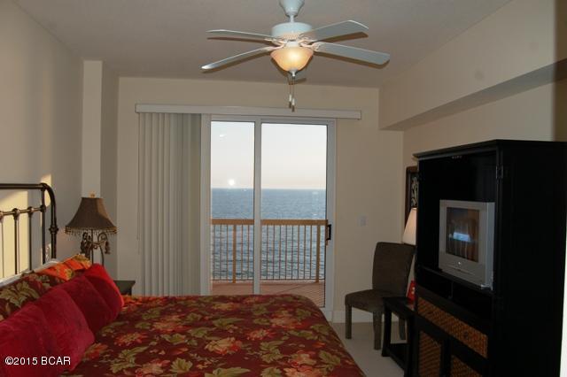 If your Beachfront 1BR Condo Wish List includes: (1) Master Bedroom on the Gulf. (2) Separate Bunk Room. (3). Two Full Baths (4) Parking Underground. (5) Great Rentals... Then this condo is for you!

This is one of the most sought after 1 bedroom floor plans on Panama City Beach and is ideally located on the 9th floor, just 4 floors above the pool. The king master bedroom is on the Gulf with direct balcony access. It also has a separate and large bunk room just off the entry hallway. It has 2 full baths and a sleeper sofa, which is ideal for a family of 4-6. The gourmet kitchen features granite counters and The Gulf front master suite also has a large en suite with double vanity and large garden tub. This condo is being offered fully furnished, and has a seasoned rental history. The Sunrise Beach Resort is ideally located only 1 mile east of Pier Park and near Sharky's and Gulf World. It features amazing resort style amenities, including: 346 feet on the Gulf of Mexico, large Gulf front fitness center, covered parking in garage under the building (you don't have walk across the street), 2 Gulf front swimming pools, 2 Gulf front spas, children's mushroom play fountain, BBQ area with gas grills and more! Finally, the Sunrise HOA fees are among the most affordable on the beach and they include full wireless internet throughout the resort. Sunrise is also owner controlled, which means the homeowners own the gym, the pools, and receive the income from the beach chairs, etc.