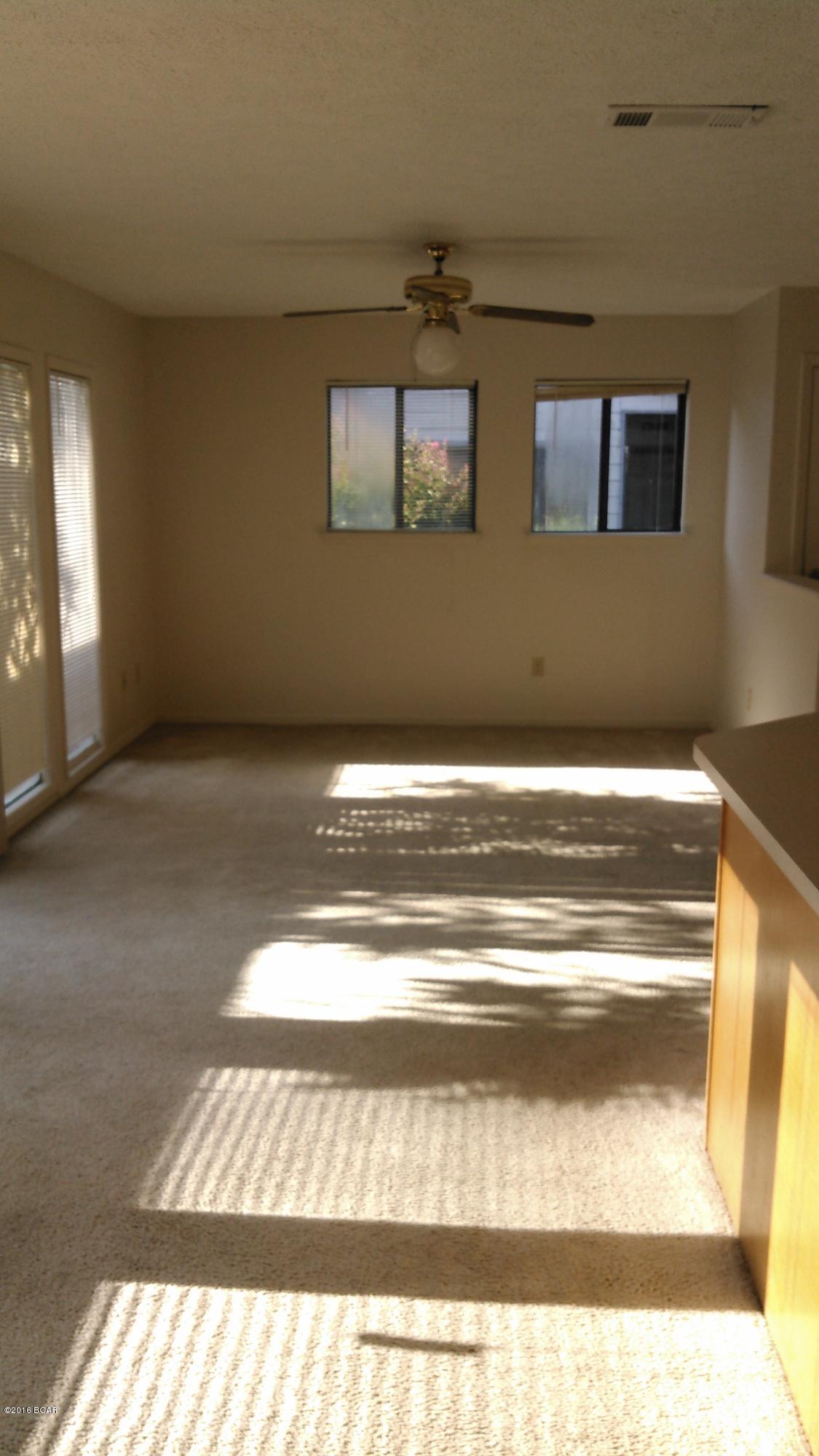 Quaint, private one story 2bd/2ba end unit in quiet residential area within walking distance to downtown, one mile to 15th St. shopping and amenities; one and half blocks from Garden Club Drive walking park.  Washer/dryer closet, open and sunny living and dining area with private fenced garden patio, and secure outside storage.  Sorry, but NO PETS - Non-negotiable {unless your pet is a registered certified service dog; for same a pet deposit is required.}  $30 APPLICATION FEE.  Owner is listing agent.