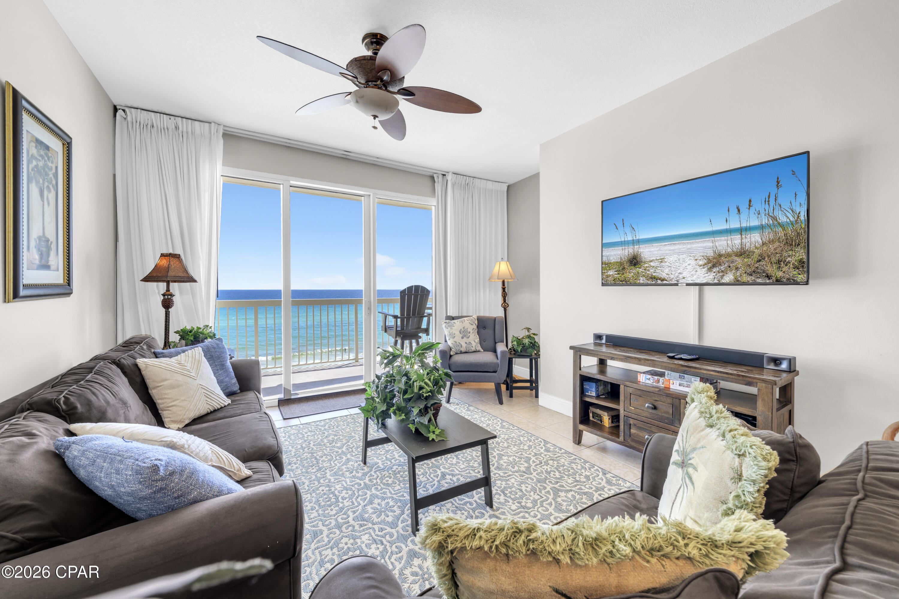 Excellent opportunity at Celadon Beach Resort -- an absolute must-see! Experience luxe seaside living with a true toes-in-the-sand location directly on the emerald waters of the Gulf. Celadon 502 showcases one of the most sought-after floorplans in Panama City Beach: a Gulf-front master suite with balcony access, a second bedroom, a separate bunk room, and two full baths. Thanks to the dedicated bunk room, the condo lives and rents as a 3BR/2BA, comfortably sleeping eight. The open layout, 9' ceilings, and triple-panel sliding glass doors flood the space with natural light and frame stunning Gulf and sunset views from the living room, dining area, kitchen, balcony, and master suite. Offered fully furnished and truly turnkey, this condo is ready to enjoy or rent immediately. Perfectly positioned on the desirable fifth floor, this residence offers an ideal elevation -- high enough for sweeping views of the emerald waters and sugar-white beaches, yet close enough to still enjoy the sights and sounds of the Gulf below. Nestled on the peaceful west end of Panama City Beach, Celadon offers the perfect balance of tranquility and convenience, just 10 minutes to both 30A and Pier Park. Resort-style amenities include 283 feet of pristine Gulf frontage, two pools (indoor/outdoor and Gulf-front), hot tubs, a tennis court, fitness facility, media room, and covered parking with walk-over access. Whether as a vacation home, full-time residence, or high-performing rental, Celadon 502 is a rare find and an exceptional Emerald Coast retreat. Don't miss this opportunity. All measurements deemed accurate; buyer to verify if important.