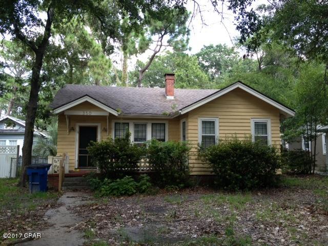Charming Cove home featuring wood floors, fire place and formal dining room with office. The kitchen features stainless steel appliances and granite counter tops. Closets are cedar lined. Back yard is fenced.