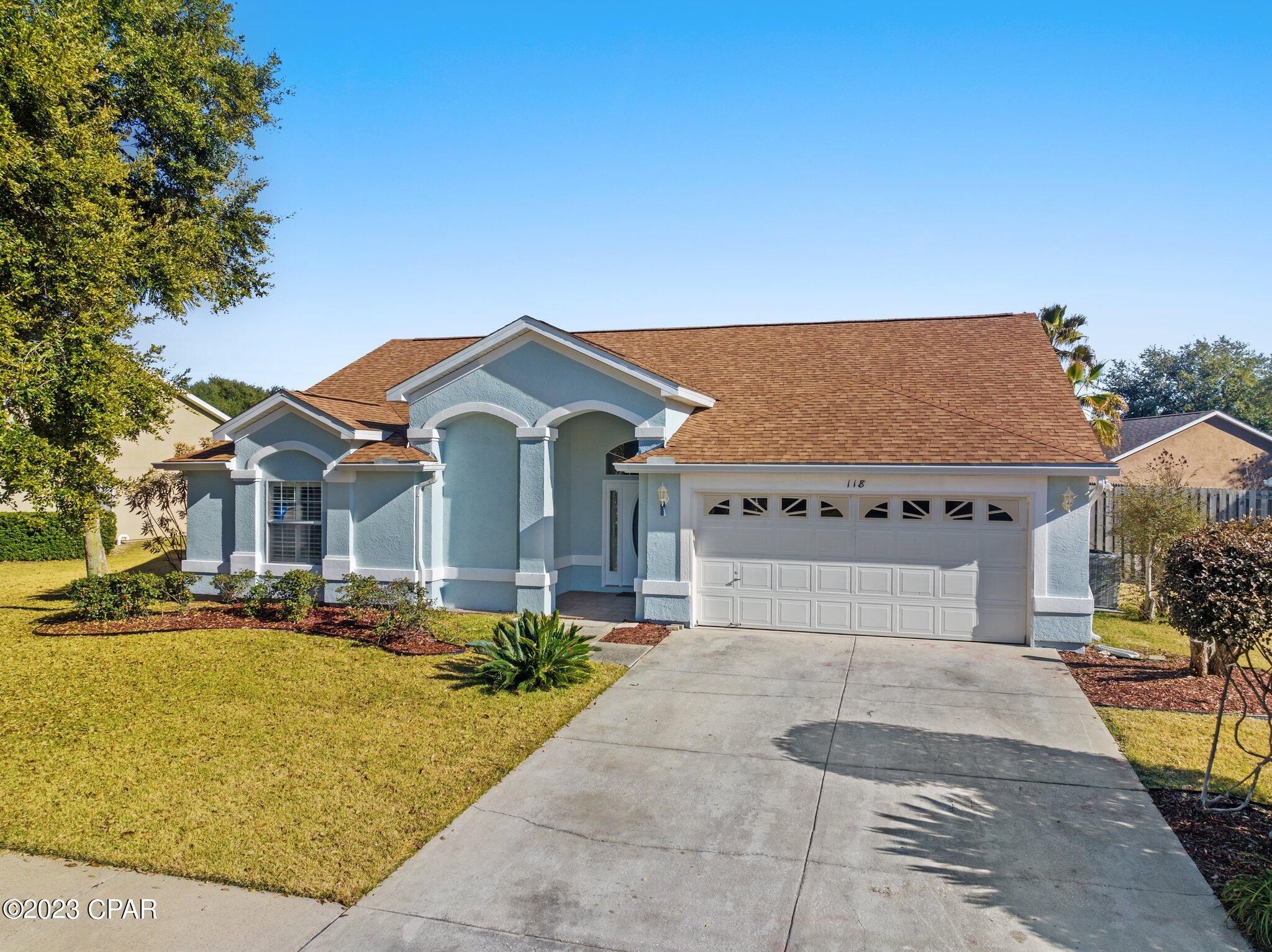 'CURRENTLY UNDER CONTRACT, SELLER WILL CONSIDER BACKUP OFFERS' Here is an opportunity to own a 3-bedroom, 2 ½ bath home with new a roof (2021) and exterior paint (2022) in the heart of PCB. Summerwood is located 1 mile from the world's most beautiful beaches, 1 mile from Pier Park & 14 miles from Northwest Beaches International airport. The backyard oasis can be seen upon entering the home through the family room double doors. The family room features a vaulted ceiling, built in bookcases, and a gas fireplace. The double doors lead to a large fenced in backyard that features a concrete inground pool/hot tub with a screened enclosure. The enclosed back patio will become a second living space. The yard has mature landscaping and a large double palm. The pool is kidney shaped with decorative tile work & hot tub that cascades into the pool. The pool pump was replaced in 2021. The back patio features ceiling fans and an outdoor sink. The kitchen has a breakfast bar, double sink and separate sitting area that can be used as a breakfast nook. The room to the left of the entryway can be used as an additional sitting area, dining room or office. There is also a jack and jill half bath with a pedestal sink that can be used for guests or homeowners. The Master bedroom has 2 walk-in closets and an ensuite bathroom. The Master bathroom features double sinks, a tiled shower with a built-in tiled bench and an additional door that leads to the enclosed backyard patio. There are 2 additional bedrooms that share a bathroom with a tub/shower combo.  The home has recessed lighting, arched entryways, plantation shutters, tile throughout the main living areas and carpet in the bedrooms. The double garage features built-in cabinets, an outdoor sink, and houses additional attic space. The laundry has cabinets for additional storage as well. HVAC was replaced in 2018. Come see all this beach house has to offer. Low HOA fees for such a nice well-kept community! The neighborhood also has a community pool, bathhouses and sidewalks. Please verify measurements and information that is important.
