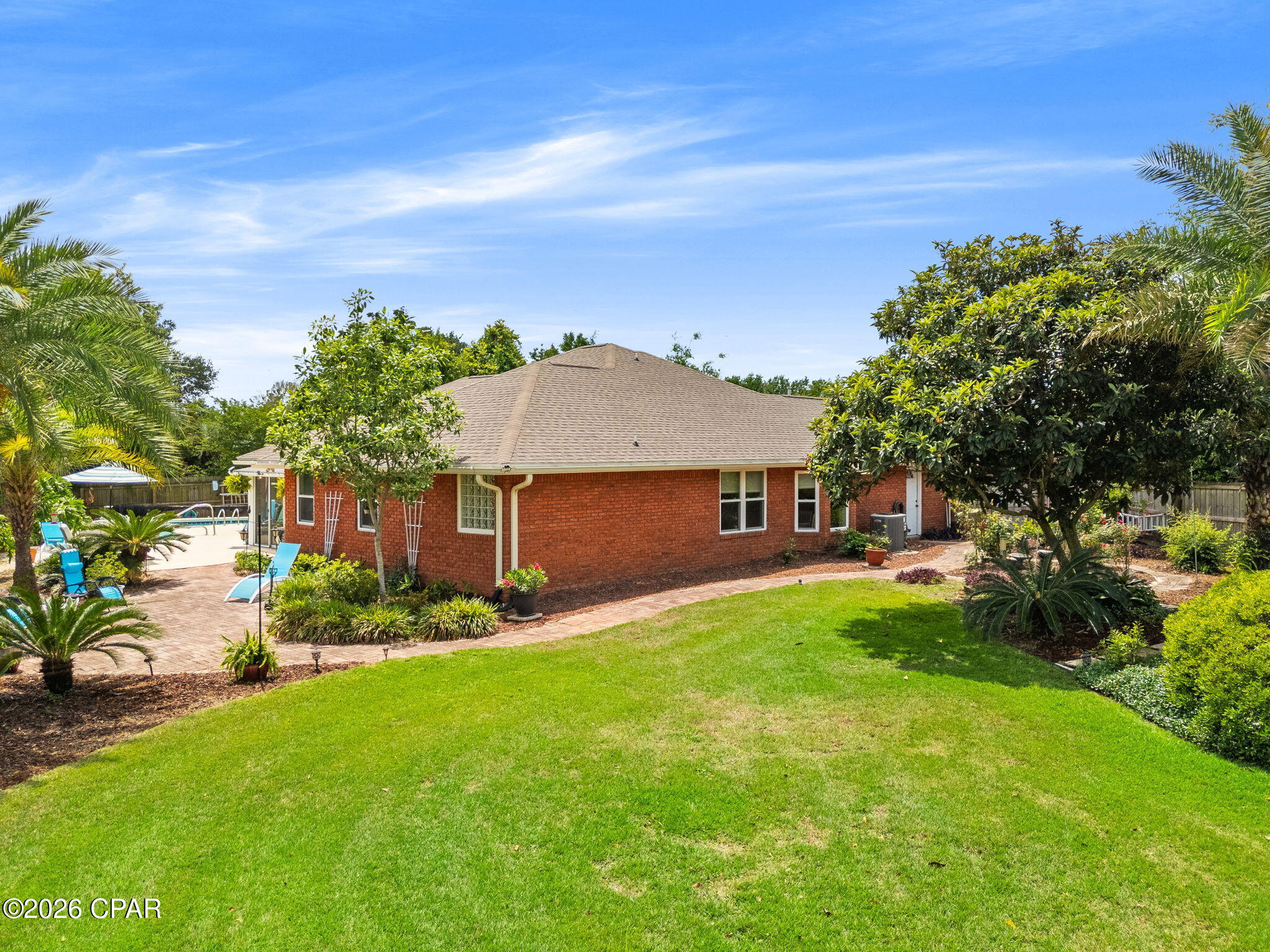 Assumable VA Loan!! 5.25%

Welcome to this beautifully maintained all-brick home tucked away at the end of a quiet cul-de-sac in the desirable Northshore subdivision. Offering 3 bedrooms, 2 bathrooms, and a rare three-car garage, this property combines comfort, space, and functionality in a peaceful neighborhood setting.

Situated on a spacious, well-manicured lot, the home is surrounded by lush landscaping and fruit trees, creating a private backyard retreat. Inside, you'll find an abundance of natural light, high ceilings, and an open-concept layout designed for both everyday living and entertaining. The kitchen features stainless steel appliances and flows seamlessly into the main living areas, while a second living space provides flexibility for family gatherings, holidays, or a cozy retreat.

One of the standout features is the heated and cooled sunroom--perfect for enjoying your morning coffee or relaxing year-round while overlooking the backyard oasis. Step outside to your private pool, ideal for soaking up the Florida sunshine and entertaining guests.

Additional highlights include an oversized driveway with plenty of room for boats or RVs, no HOA, and a location in Flood Zone X for added peace of mind. Major updates have already been taken care of, including a new roof in 2020, pool resurfaced in 2017, and updated windows installed in 2017.

This home offers the perfect blend of indoor comfort and outdoor living--ideal as a primary residence or a place to gather and make lasting memories.
A newer riding lawnmower will convey with a full price offer. 

All measurements and items of importance to be confirmed by buyer or buyer agent.