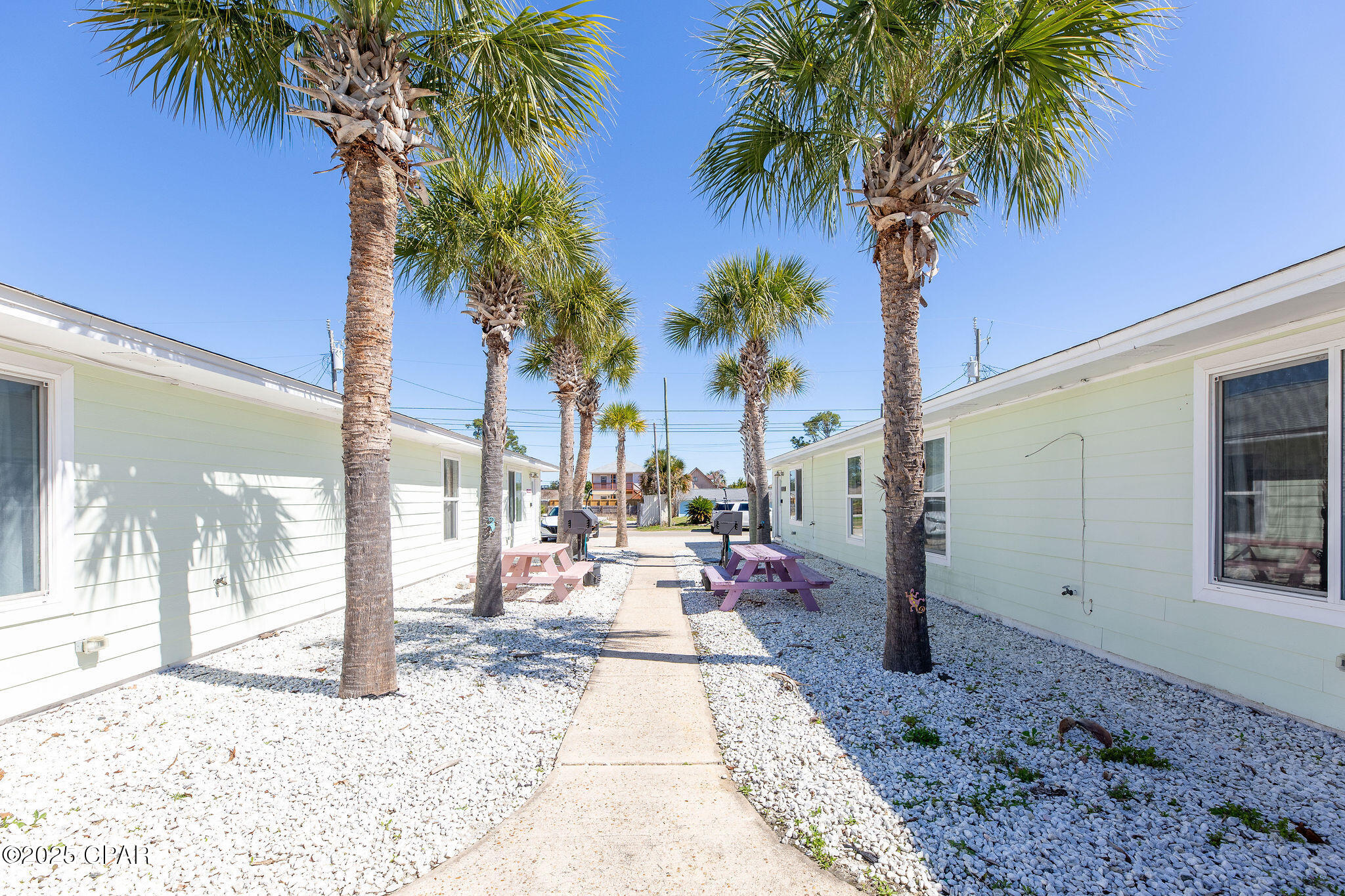 CURRENTLY UNDER CONTRACT, SELLER WILL CONSIDER BACKUP OFFERS Short-Term Rental Powerhouse | 8-Bedroom Duplex | 3 Blocks from the Beach! Investor's dream! This high-income producing, fully furnished 8-bedroom, 4-bathroom duplex is a short-term rental machine, located just three blocks from the sugar-white sands of Panama City Beach! This sale includes two parcels, 5801 & 5803 Pinetree. These units combined gross income for '24 was over 126k!!! Renovated in '22, each unit of this multi-family property features 2 bedrooms, 1 bath, a full kitchen, full size washer and dryer, and an open-concept living space, making it perfect for beach trips! Guests love the modern coastal décor, fully stocked kitchens, private back porches, and fenced backyard with community pool and entertainment space. With NO HOA, strong rental history, and multiple revenue streams, this is the perfect turnkey investment opportunity. Just minutes from Pier Park, St. Andrews State Park, top restaurants, and attractions, this property is positioned for maximum occupancy year-round. Whether you're looking to expand your STR portfolio or own a versatile beachside retreat, this one won't last long! Contact us today for financials and a private tour!