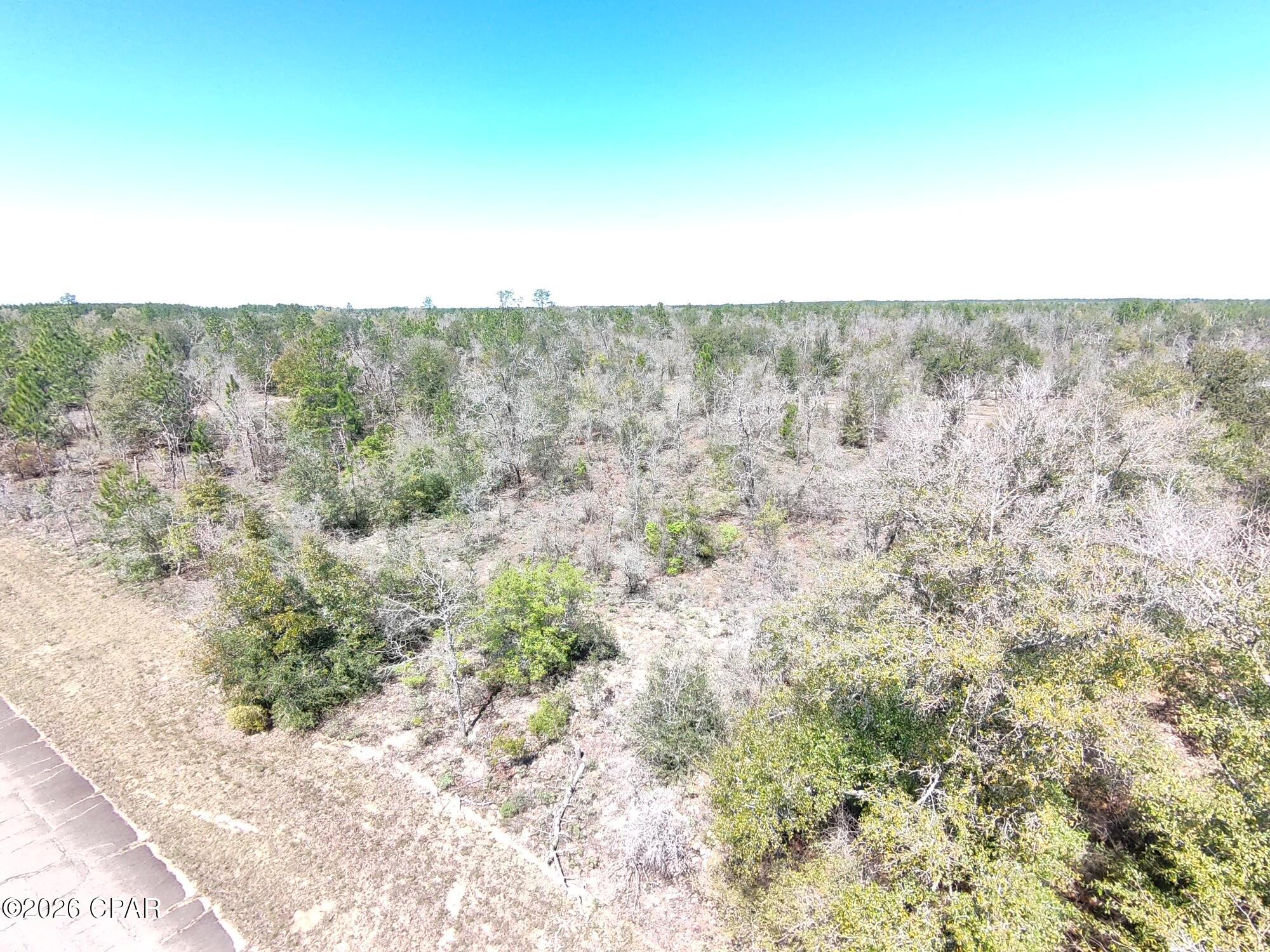 LAND BUYERS AND INVESTORS TAKE A LOOK.... Excellent opportunity to own a .229-acre flat and level building lot in Unit 11 of Sunny Hills, located at Lot 18 on Sheffield Street. Priced right for a quick sale! Additionally, Lot 17 next door is also available from the same seller at the same price, providing a rare opportunity to secure side by side lots for added space, flexibility, or future development options. Sunny Hills continues to attract buyers due to its convenient access to Highway 77, with Chipley to the north and Panama City and the Gulf Coast beaches to the south. If you're looking for a competitively priced investment in a booming Northwest Florida community, this lot deserves your attention.