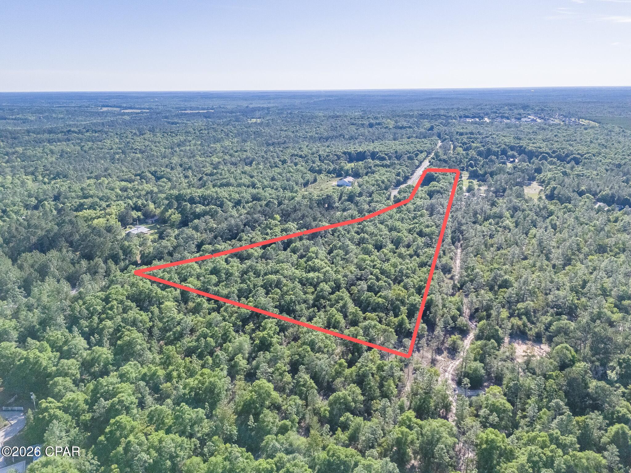 Build your dream homesite on this spacious parcel located in the growing DeFuniak Springs area, offering peaceful country living with plenty of room for a new home, mobile home, or investment opportunity. Conveniently located approximately 15 minutes to DeFuniak Springs, 35 minutes to Crestview, 1 hour to Panama City Beach, and just over an hour to the beautiful beaches of 30A and Destin. Enjoy privacy, space, and easy access to nearby shopping, dining, and recreation. Buyer to verify all property details, utilities, zoning, and land use.

Flood Zone X
No wetlands
Power at the road
Water available through Argyle