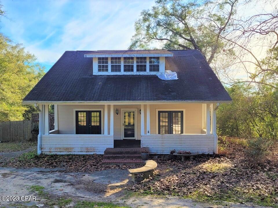 Great opportunity to own a 2-story historic home on a large lot in the heart of DeFuniak Springs, Florida. As you enter the home, you see a huge living room with built-in bookcases.  This home features hardwood floors, high ceilings, and crown molding. The updated kitchen has a large island with a cooktop. Kitchen has wood beams and has a nice dining area overlooking the back yard.  On the second floor is the huge master bedroom. The attached master bath has a whirlpool tub and a separate shower.  Large backyard features an 16X32 in-ground gunite pool and a brick bar-b-q area.