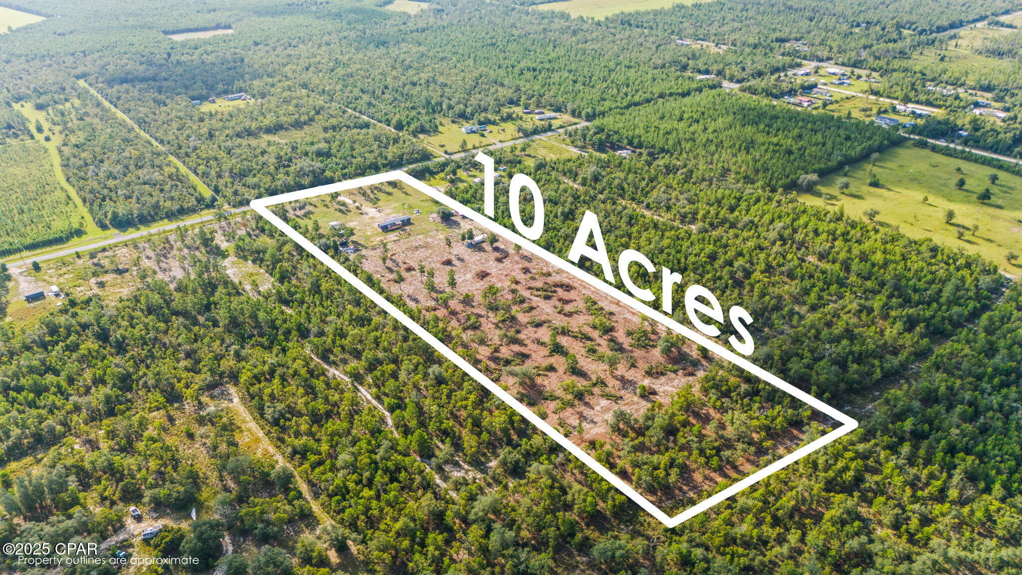 Country Living at Its Finest - Only 40 Minutes to Panama City!
Welcome to 6807 NW Porter Grade Rd, Altha, FL - a beautiful 10-acre property offering the perfect blend of peaceful country living and modern comfort. The land is cleared, with all utilities already installed, making it ready for your vision.
This completely renovated home has been transformed inside and out, featuring:
New roof, siding, insulation, ceilings, walls, windows, doors and light fixtures.
Fresh interior and exterior paint.
New trim and baseboards.
Updated electric and plumbing.
Gorgeous tile flooring throughout.
Brand-new kitchen with stainless steel appliances, quartz countertops, and stone backsplash.
Fully updated bathrooms with stand-up showers.
New AC units.
Spacious, fully equipped laundry room.
Large front and back porches to enjoy your morning coffee or relax under the star-filled night sky. 
Side carport—perfect for storing tools, equipment, or outdoor gear.
Comes fully furnished - ready for you to move right in or start generating income as a short-term rental
The property also includes a large corral for animals (goats, chickens, ducks, geese, pigs—you name it) and a cozy fire pit near the back porch—perfect for roasting s'mores on summer nights or staying warm during crisp winter evenings.
Just minutes from the mossy pond, a beautiful lake like body of water with a public beach, this home offers endless possibilities—your private retreat, a family homestead, or an income-producing investment.
Far enough for privacy, close enough for convenience.
Don't miss your chance to see it in person—schedule your private showing with your favorite Realtor (me) today!
Measurements are approximate; please verify if important.