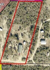 Looking for 2.5 Acres in country setting this is it.  Property has been cleared and dagmaged mobile home has been removed.
Well & Septic are on the propety.  Property is cleared and perfect to build or set up your manufactured home.  Let the serinity of this land become your new home site.
Buyer to verify lot dimensions.
