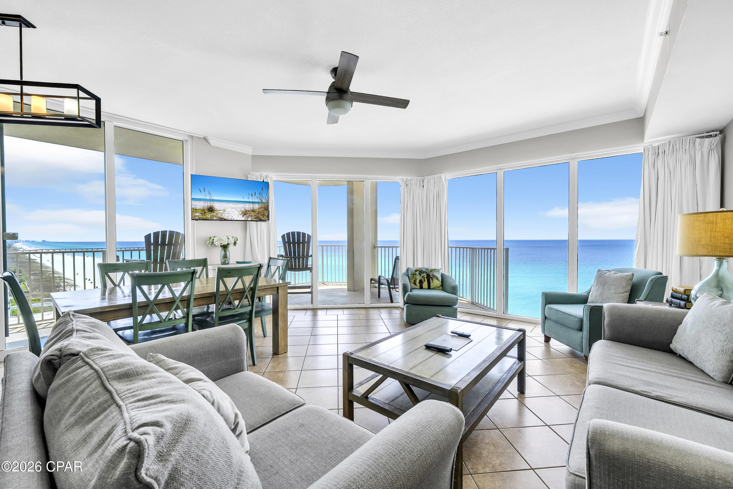 Welcome to one of the most sought-after offerings in Panama City Beach--Tidewater Beach Resort Unit 717. This rare east-facing corner residence showcases the highly desirable ''J'' floor plan, highlighted by an expansive wraparound balcony that truly sets it apart. Positioned at the ideal elevation, enjoy sweeping views of the emerald Gulf waters and sugar-white sand below. Inside, 9-foot ceilings and walls of glass fill the space with natural light, creating a bright, open living area designed to capture panoramic coastline views and unforgettable sunrises. Thoughtfully configured for both personal use and strong rental performance, the condo comfortably accommodates up to 10 guests. The layout includes two spacious master suites, an additional guest bedroom, and a custom built-in bunk area with wainscoting for added coastal character--ideal for families or larger groups. The open-concept kitchen and living area flow seamlessly together, featuring granite countertops, stainless steel appliances, coastal finishes, and uninterrupted Gulf views. This unit has been meticulously maintained and is offered fully furnished with high-end pieces, making it a true turnkey opportunity for investors or second-home buyers. Step onto the oversized balcony and take in the breathtaking scenery--watch seasonal fireworks near the pier or simply relax as the sun sets over the water. Whether you're seeking a private retreat, full-time residence, or high-performing rental, this property delivers on every level. Convenience is key, with close proximity to the elevator and three allotted parking spaces in the garage, connected via a covered skywalk across Front Beach Road. Built in 2008, Tidewater Beach Resort is ideally located on the desirable west end of Panama City Beach, just minutes from Pier Park's premier shopping, dining, and entertainment. The resort offers one of the most comprehensive amenity packages in the area, including over 600 feet of beachfront, multiple outdoor pools, a heated indoor pool, fitness center with Gulf views, on-site movie theater, coffee bar, and an exclusive top-floor owner's lounge. Experience Gulf-front living at its finest--where space, views, amenities, and location come together in one exceptional offering. All measurements deemed accurate; buyer to verify if important.