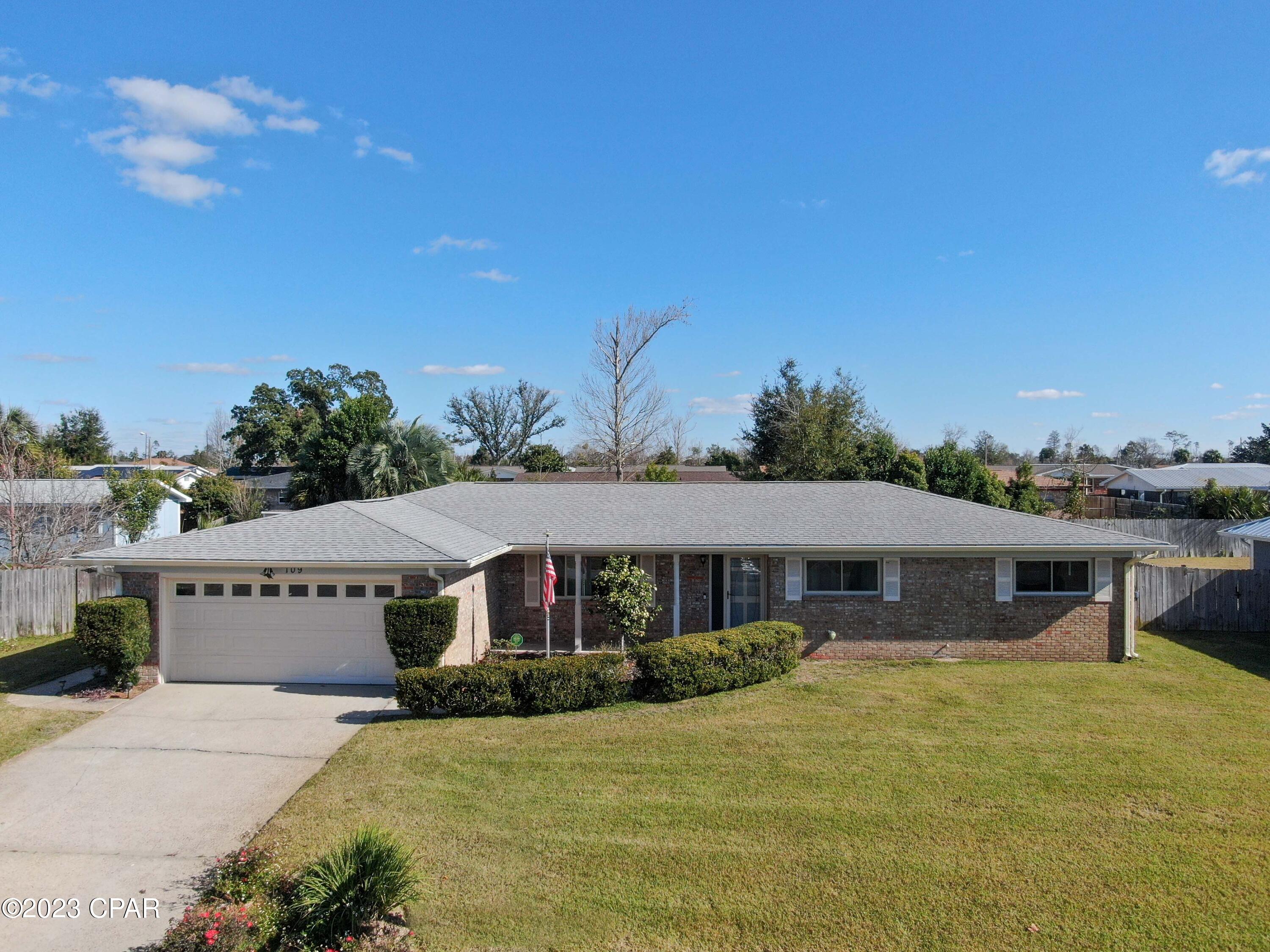 This wonderful spacious all brick home is located in a quiet neighborhood within walking distance to shopping, restaurants, parks , essential amenities & within 10 min. of Tyndall Air Force Base. Home includes a living room, family room,   dining room, 3 bedrooms, 2 bathrooms, and a great kitchen with stainless steel appliances. A large back yard with an In ground pool off of a covered patio. Yard also has a  yard building & a privacy fence with gate openings on each side of the home. There is a heated and cooled laundry room with exit/entry to back yard or inside the home.   All sizes are approximate , if important to buyer, please verify.  Call your favorite Realtor for a showing today!