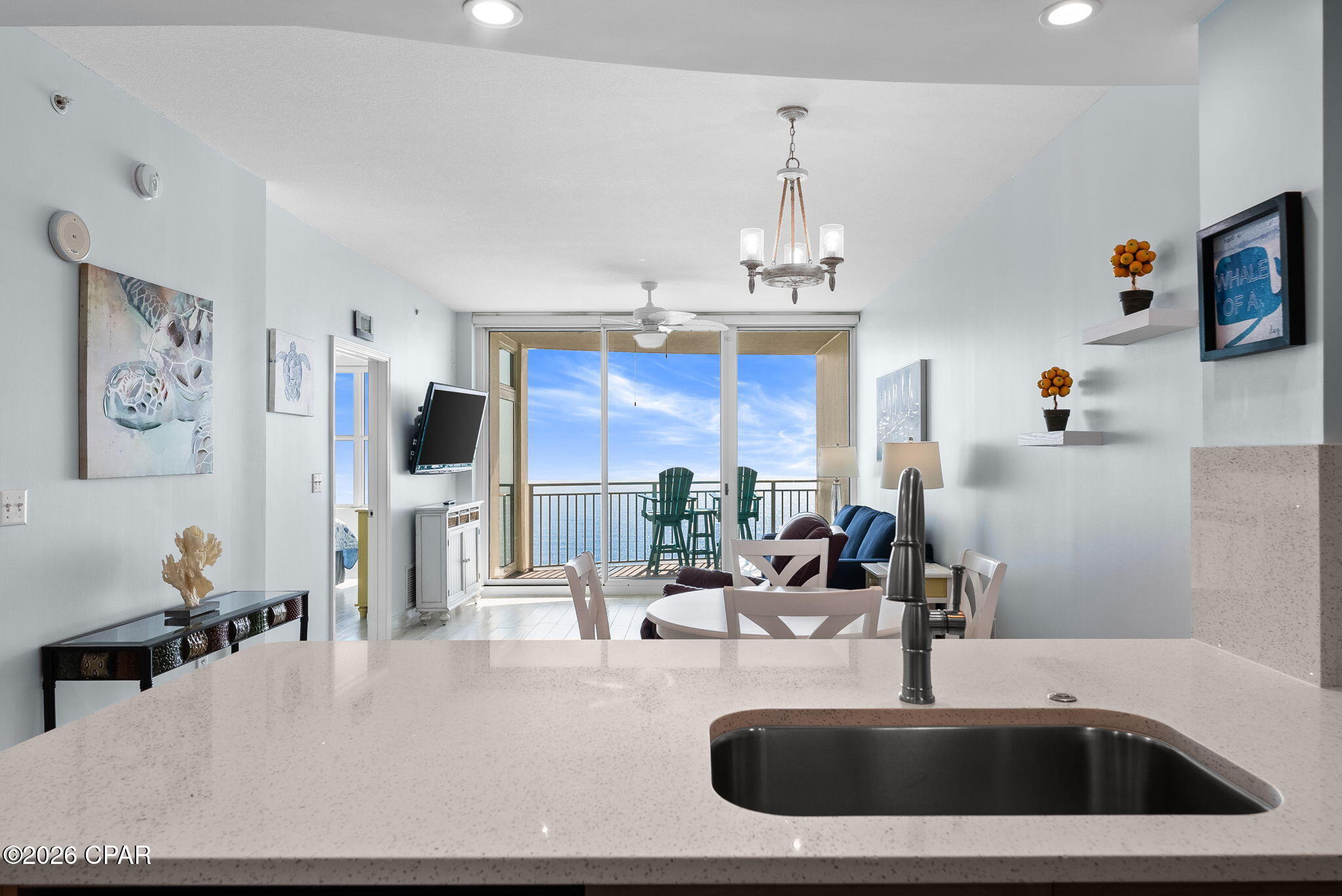 Here is your opportunity to own one of the nicest 1BR condos at Aqua, the most upscale resort in PCB.  This rare 1BR floorplan has the master suite on the Gulf with separate door access to the balcony, 2 full bathrooms, and a separate bunkroom. After purchasing this condo 6 years ago, the owner has invested over $50K remodeling this condo as their primary residence. Upgrades include high-efficiency geothermal HVAC, oversized water heater, Bosch dishwasher, dual bottom drawer refrigerator, stove with oven never used, wood-tile look porcelain throughout, quartz countertops, tiled master shower, new commercial grade sleeper sofa with Sunbrella fabric, leather recliner, twin bunk beds w/Jamison mattresses, Levolor power blinds, and much more (full report is available).     
The condo has a large wall-mounted flat screen TV in the living room, larger washer and dryer with sensor control, and long-lasting polywood balcony table and chairs.
Don't miss out on this opportunity to make this special condo your new 1st/2nd home or vacation rental property.


The condo has tile throughout the main living areas and bathrooms. The kitchen features a new single-level quartz countertop, stainless steel appliances and a pantry.  This unit also features a full-size/front loading washer and dryer and a lockable owner's closet

And of course, the Aqua Resort is ideally located directly across the street from the new Top Golf, only a few hundred yards from Pier Park, and also close to the new Dolly Parton Pirates Voyage Dinner Theatre.