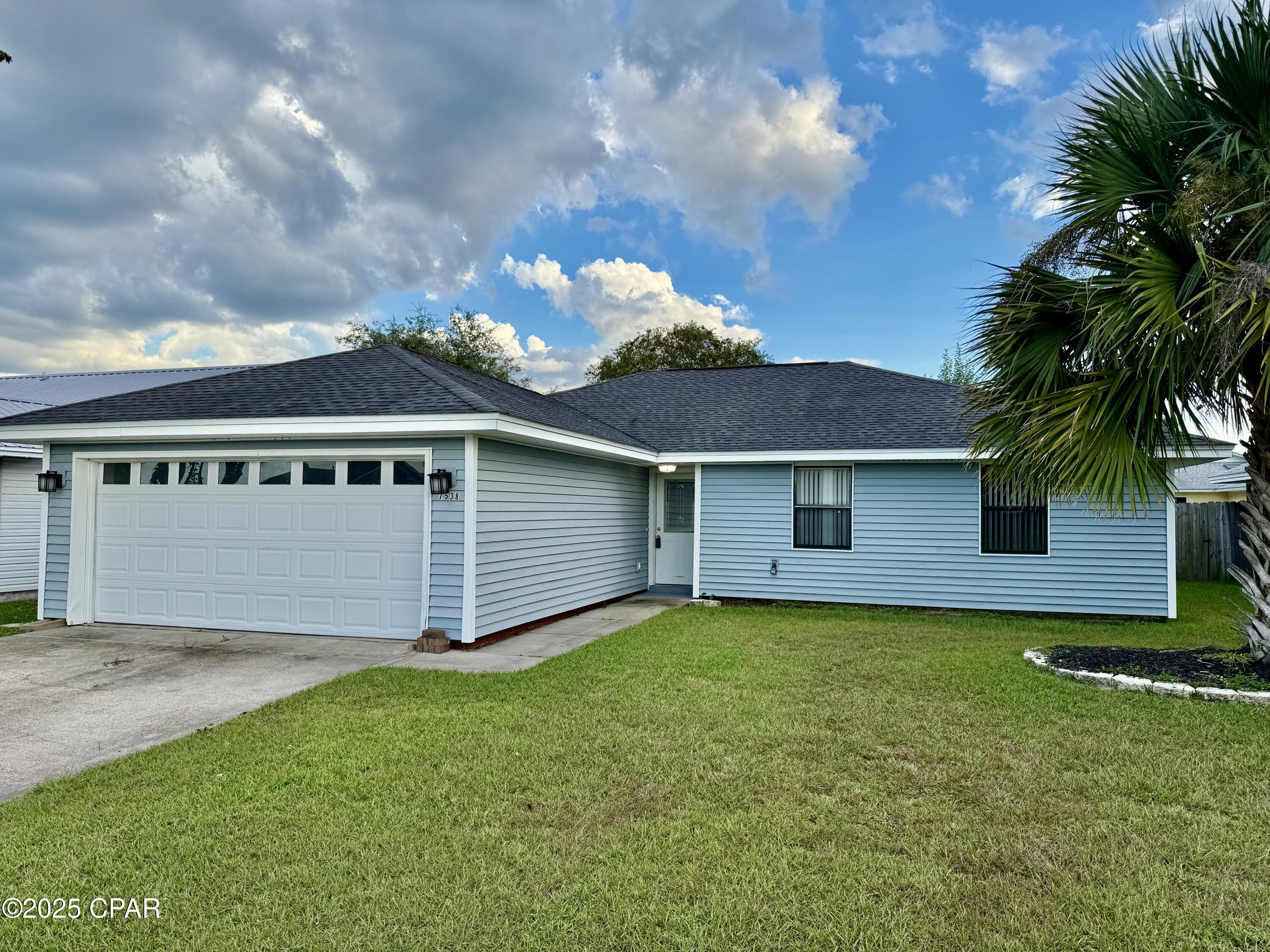 Beautifully updated and meticulously maintained, this 3-bedroom, 2-bath home is located in the highly desirable Shadow Bay subdivision. Designed with both comfort and functionality in mind, the home features an inviting open floor plan--perfect for entertaining family and friends. Tile flooring runs throughout, offering durability and easy maintenance ideal for kids and pets.

The spacious, fully updated kitchen is a standout, complete with stainless steel appliances, granite countertops, recessed lighting, a built-in microwave, and a large island with breakfast bar for casual dining. Both bathrooms have been tastefully remodeled with modern finishes, while the living area provides a warm and welcoming atmosphere centered around a cozy fireplace.

Step outside to enjoy a screened-in rear patio--perfect for relaxing evenings--overlooking a private, fully fenced backyard. A two-car garage adds convenience and ample storage space.

Ideally situated near shopping and dining, this home is just 20 minutes from Tyndall Air Force Base and Eastern Shipbuilding, and only 30 minutes from the beautiful beaches of Panama City Beach. This move-in-ready home offers the perfect blend of style, comfort, and location.