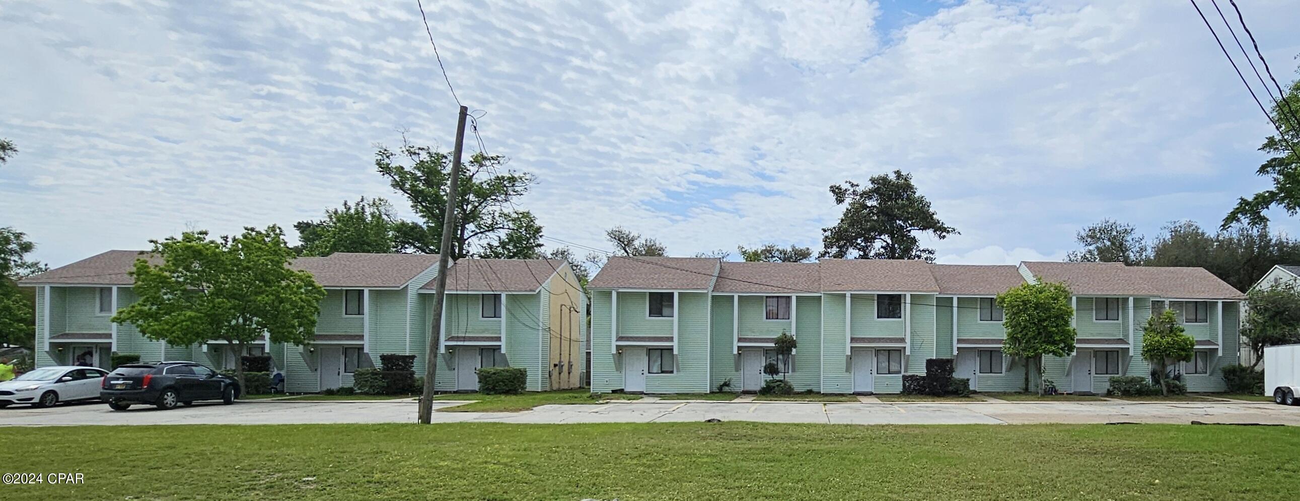 RARE opportunity to own 10(TEN) 2 bedroom/ 1.5 bath townhomes complete with an additional parcel!   Each unit has a separate address and meter making it EASY to manage.  Currently used as a mixture of short term rentals, mid-term rentals, staff housing and storage.  The proximity to Tyndall AFB, Mexico Beach, Panama City and Panama City Beach make this a DON'T MISS.   Owner financing may be an option with a sizable down payment and agreeable terms.  Do not disturb guests/tenants.  BUYER TO VERIFY ALL INFORMATION DEEMED IMPORTANT. Most furnishings convey. Photos are from one unit.  Floor plans are same but furnishings and finishes vary.