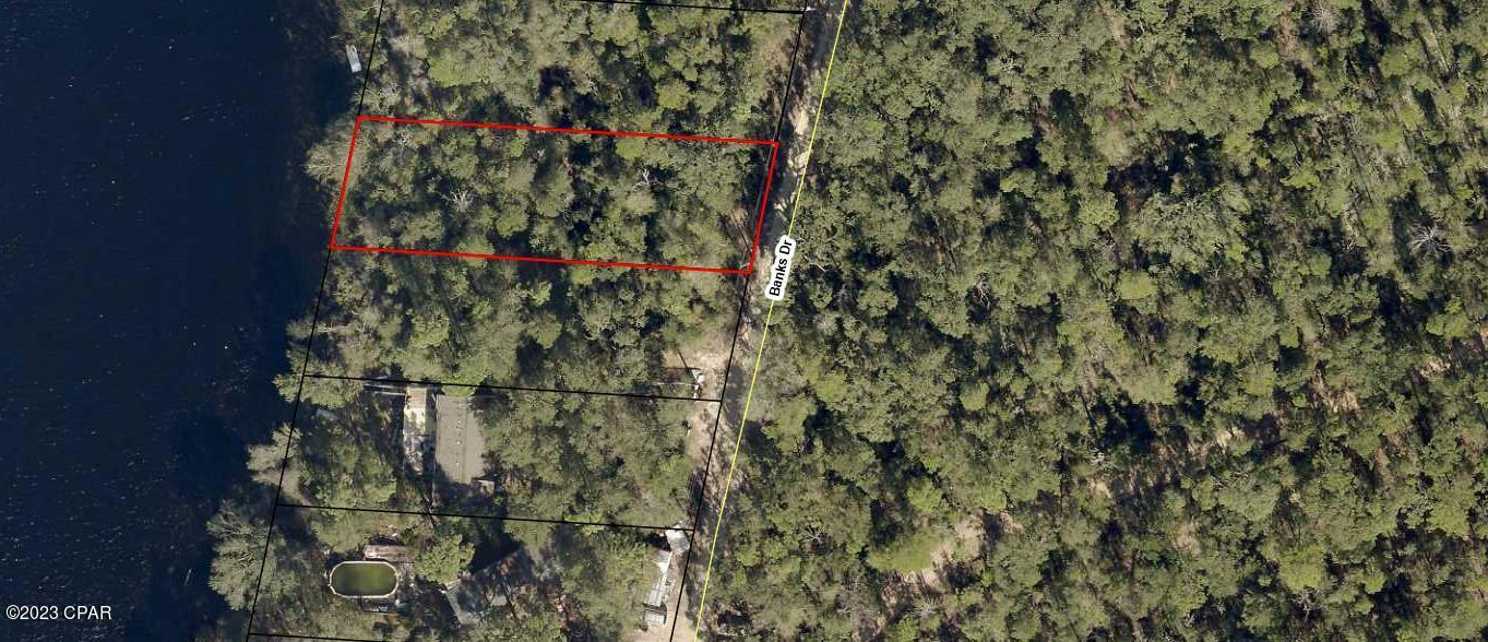 Awesome Lake Front Parcel that can be your forever home site or your vacation get away. Build your dream home now or keep for future investment, possibilities are endless. This parcel has some of the best fishing on the planet along with kayaking, swimming and just minutes from the deep cool water springs. Property is approx 25 minutes from the sugar white sands of Panama City Beach and Famous Pier Park Shopping, Tyndall Air Force Base, Marianna Caverns and several State Parks. Shopping and Fine Dining is just down the road along with movie theatres, entertainment and hospitals. Parcels like this are becoming harder to find so call today for your private showing. Property is just off highway 20 for ease of access. Life is short, make your decision today !