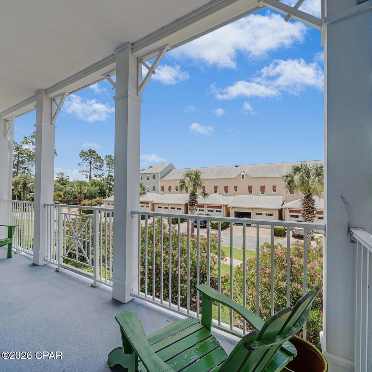 **WOW**- $5,000 BUYER CREDIT AT CLOSING for a full price offer!  This Island Reserve condo has an open concept with a split floor plan boasting 2 master suites plus an additional half bath, beautiful finishes, granite countertops and stainless steel appliances.  Upgrades include new living area flooring (July, 2026), soft-close cabinets, tinted windows to keep the unit cooler, custom wood closet shelves, ''never used'' dishwasher, new washer/dryer and between glass window blinds.  Park your car and your golf-cart in the covered parking garage - no stairs or elevators - and take a short 1.2-mile golf-cart ride to one of the Top 10 Beaches in America.   You will love the laid-back lifestyle and amazing amenities in Island Reserve - lagoon style pool, pickleball, basketball, fitness center and so much more!   No short-term rentals here, just peace and quiet in resort-style living.  This spacious 2nd story unit is easy to maintain and enjoys very low utility bills. Island Reserve is a gated community with a security officer, controlled access, security cameras and perimeter fencing that will provide you with Safety and Peace of Mind.