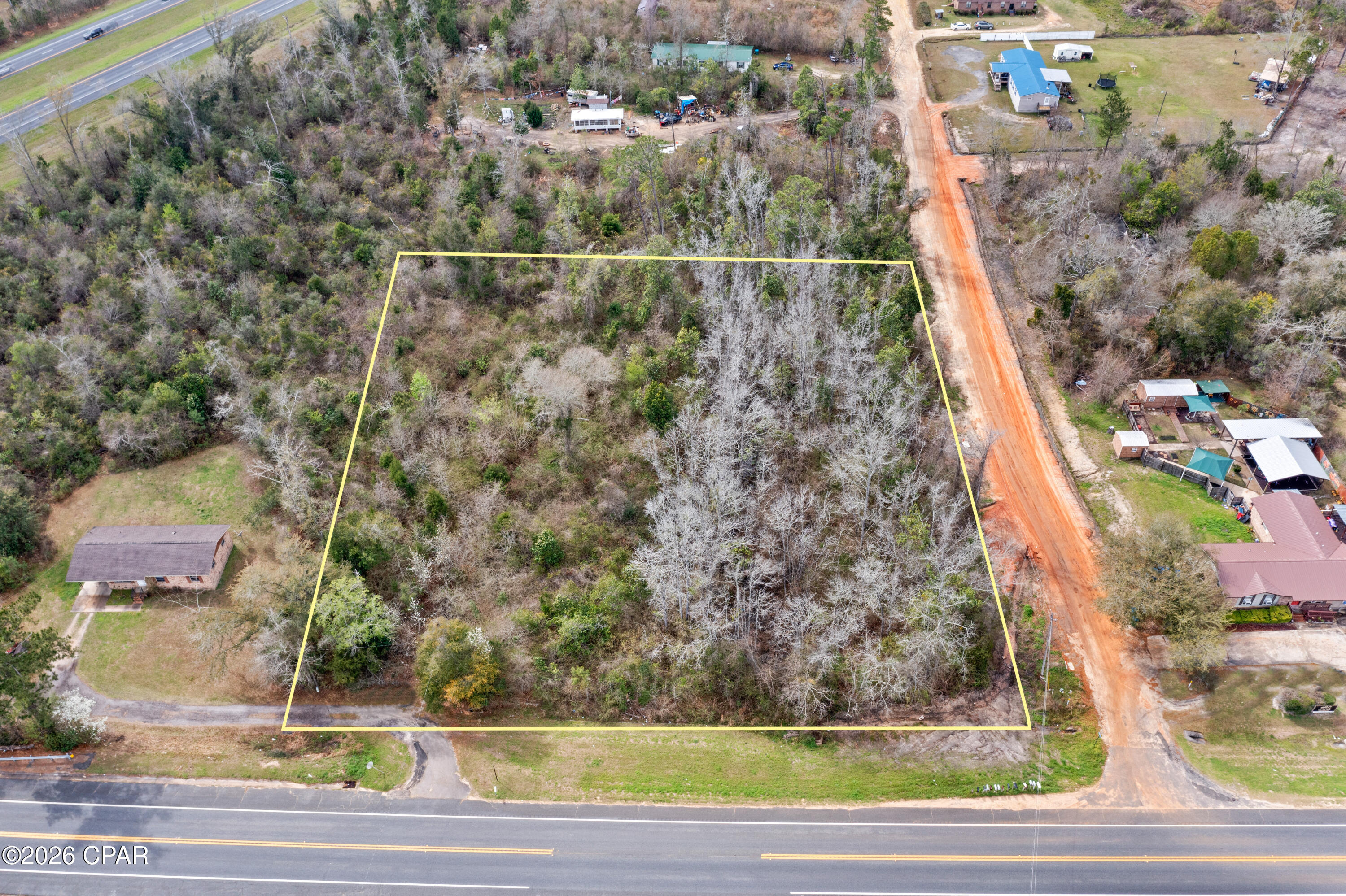 Discover the perfect spot to build your dream home or investment property on this beautiful 2-acre wooded parcel located on Highway 73 in Marianna, Florida. This property offers a great blend of privacy and convenience, with mature trees providing a natural setting while still being easily accessible from the paved highway.

With approximately 2 acres of land, there is plenty of room for a custom home, workshop, or additional structures. The property's location offers quick access to town, shopping, schools, and medical facilities while still maintaining a peaceful country atmosphere.

Whether you're looking to build now or invest for the future, this property offers excellent potential with highway frontage and a desirable location in the Marianna area.