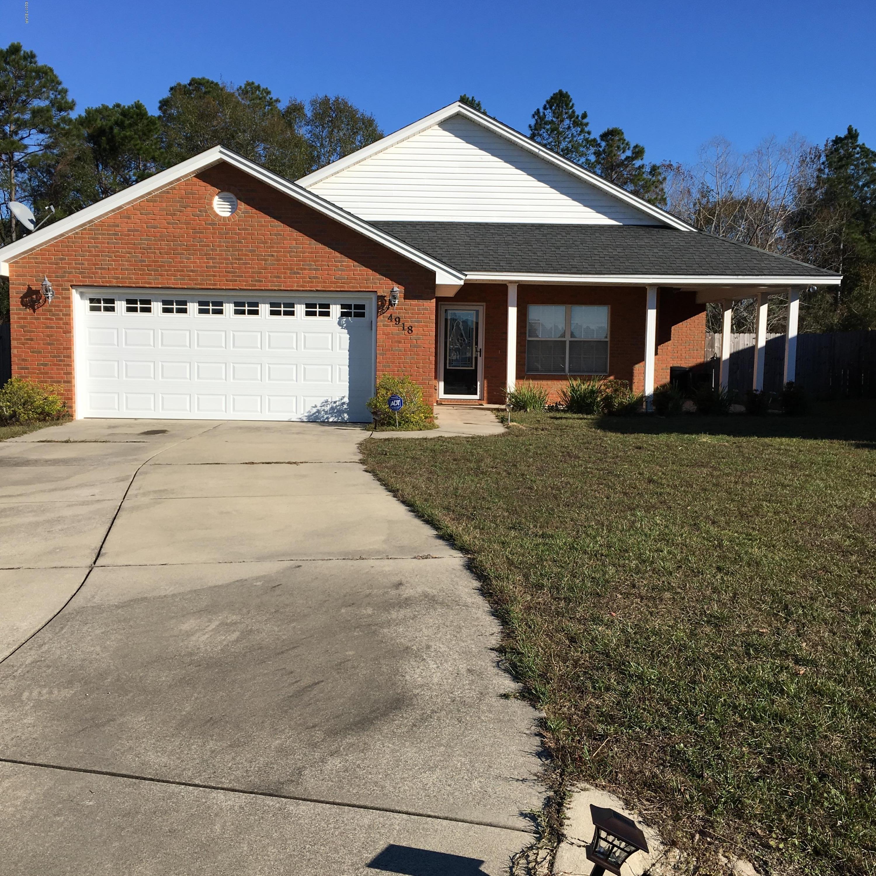 Beautiful brick home located in the Cherokee Heights neighborhood with great schools. This home features Three bedrooms and two bathrooms. Large master bedroom and massive master bath with corner tub and separate shower. Living room features a fireplace and tile floors are throughout the living areas. Laundry room has washer/dryer connections, with double car garage. Large privacy fenced backyard. Active duty military-discounted deposit-$800.