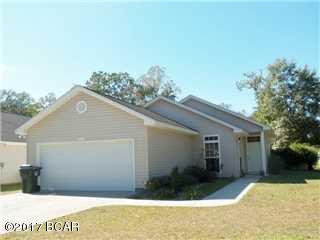 Great home on large CORNER LOT. This 1620 sq. ft. house features three bedrooms, two baths, large great room, kitchen with beautiful solid wood cabinets, breakfast area and two car garage. Split floor plan, tile in foyer, breakfast area, kitchen, baths and walk way areas. Large master with access to the outside which offers a lovely HEATED POOL AND SPA surrounded by a privacy fence. Monthly pool service is included in rent, all other utilities are tenants responsibility. Call today to schedule a showing, 850-235-0578!