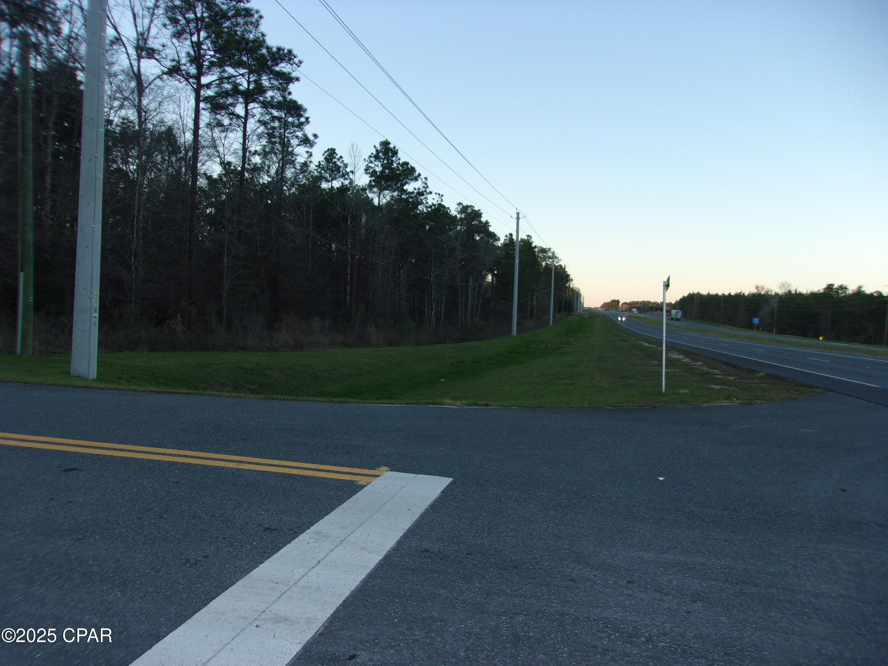 Exceptional Investment Opportunity in Bonifay, Florida! Discover the potential of this remarkable 14.23-acre parcel of vacant wooded land, ideally situated with an impressive 320 feet of highway frontage along the bustling Highway 79. This prime location is just 0.8 miles south of Interstate 10, ensuring excellent accessibility and visibility for future development. Nestled in the charming town of Bonifay, this property is only 45 minutes north of the beautiful beaches of Panama City Beach Florida, making it an attractive option for those seeking to capitalize on the growing demand for land in the area. With the ongoing expansion of Highway 79 into a four-lane thoroughfare, the value of this property is poised to increase over time, presenting a golden opportunity for savvy investors. Whether you're looking to develop residential or commercial projects, or simply hold onto a piece of land that promises future appreciation, this property offers endless possibilities. Don't miss your chance to invest in a piece of Florida's promising real estate market! Contact us today for more information and to schedule a viewing.
