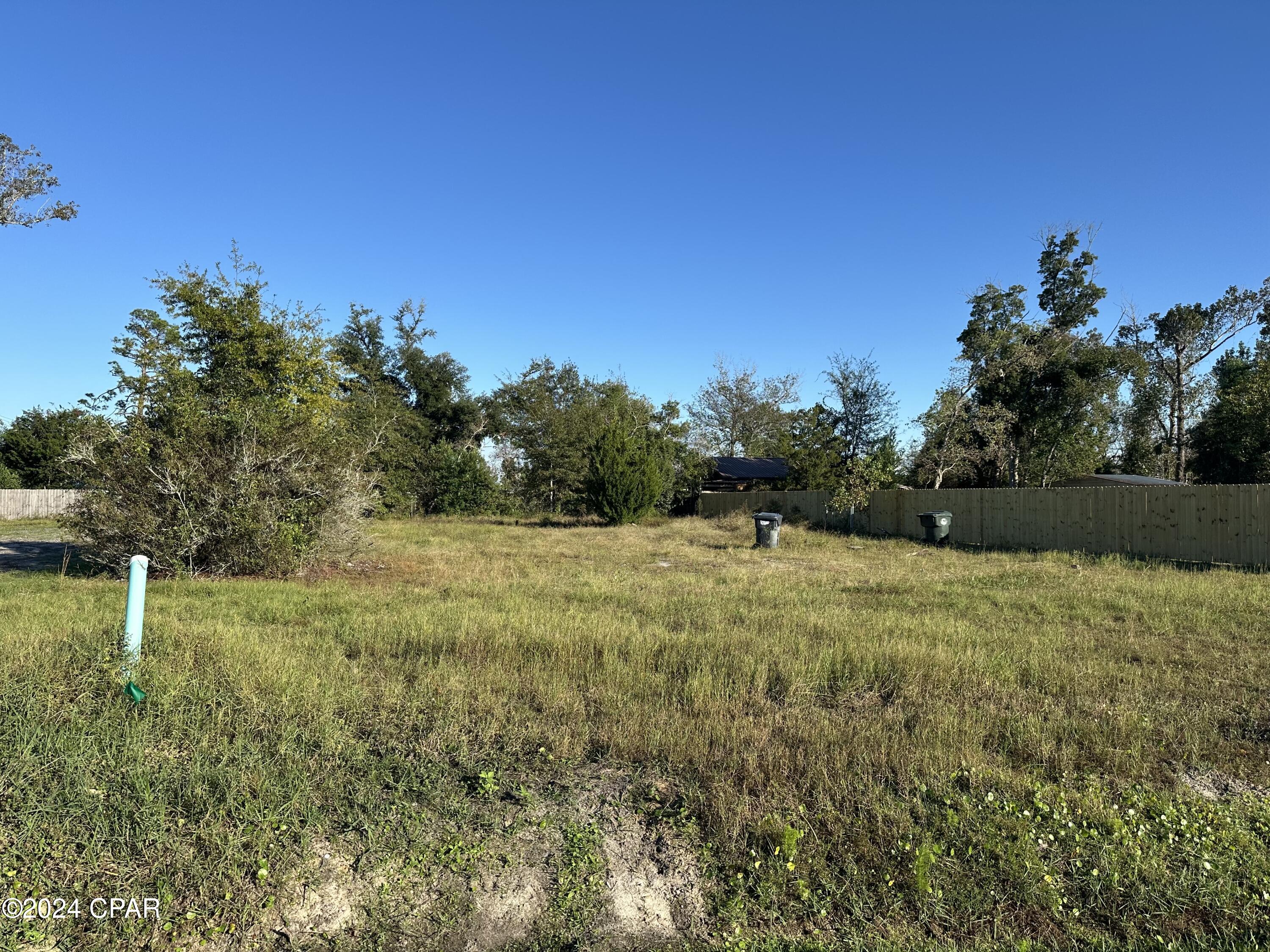 This large 75x150 lot is conveniently located in the heart of Lynn Haven. Build your dream home and be conveniently located just minutes from the beautiful parks, boat launch, schools, and all of the shops and restaurants in Lynn Haven. This lot was just completely cleared and is ready to build! 1203 Colorado Ave is also for sale. Please drive by today!