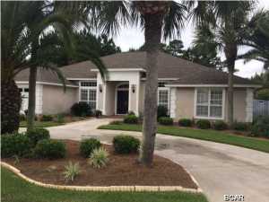 This home is move in ready and located in the gated neighborhood of Dolphin Bay. Dolphin Bay has under ground utilities & a tennis court. The home has new stainless appliances, granite counter tops, kitchen back splash, AC unit and fresh paint are just of the few new items in this awesome home. You will see pride in ownership as soon as you pull in the drive way. The landscaping is lush & mature. The Florida room has a hot tub, tv and a wet bar. The yard is large enough to add a pool if that is your desire. This homes back yard is one of the largest I have seen in Dolphin Bay. The neighborhood has a marina and they have boat slips for rent and the charge is based on the size of your boat. They charge $7.50 a foot per month + $30 a month service fee + 6.5% tax includes electric & water.