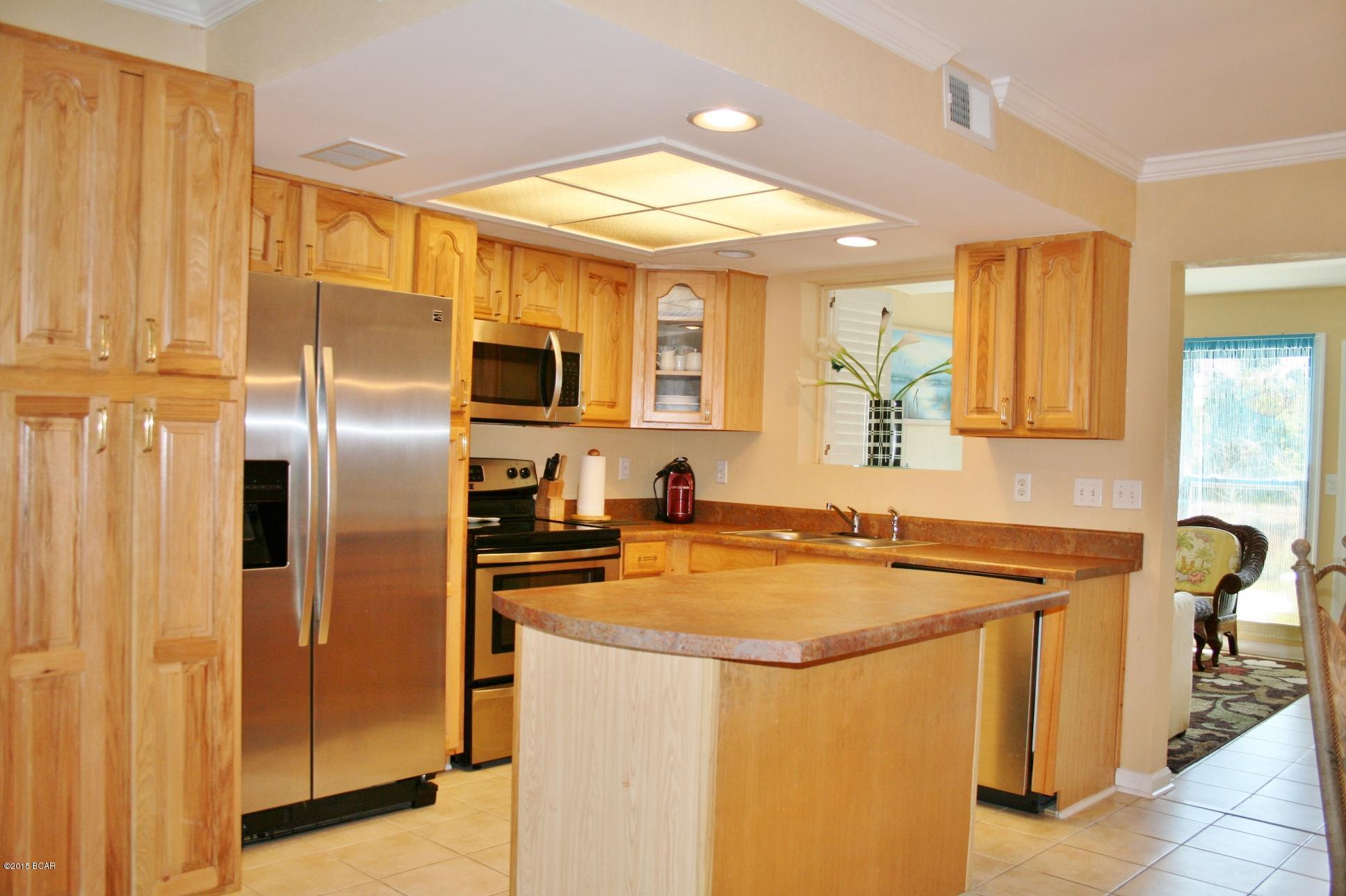 This is a very nice 2 BR with a Bonus Room Downstairs. If you are looking for that affordable Beach Getaway with several amenities CLOSE to the Beach... this is it! Association Dues only $410/qtr which means mowing your Lawn, Cable, & Trash included so no need to pay extra for those. There are 11 Pools, 4 Tennis Courts, Shuffleboard Courts, 18 hole Mini Golf, Conference Center, and a Clubhouse with a Gulf Front Pool and Snackbar. There is a 2 Pet minimum per unit with a 25 lb limit per pet. Age, SF, and dimensions are approximate... please verify if important.