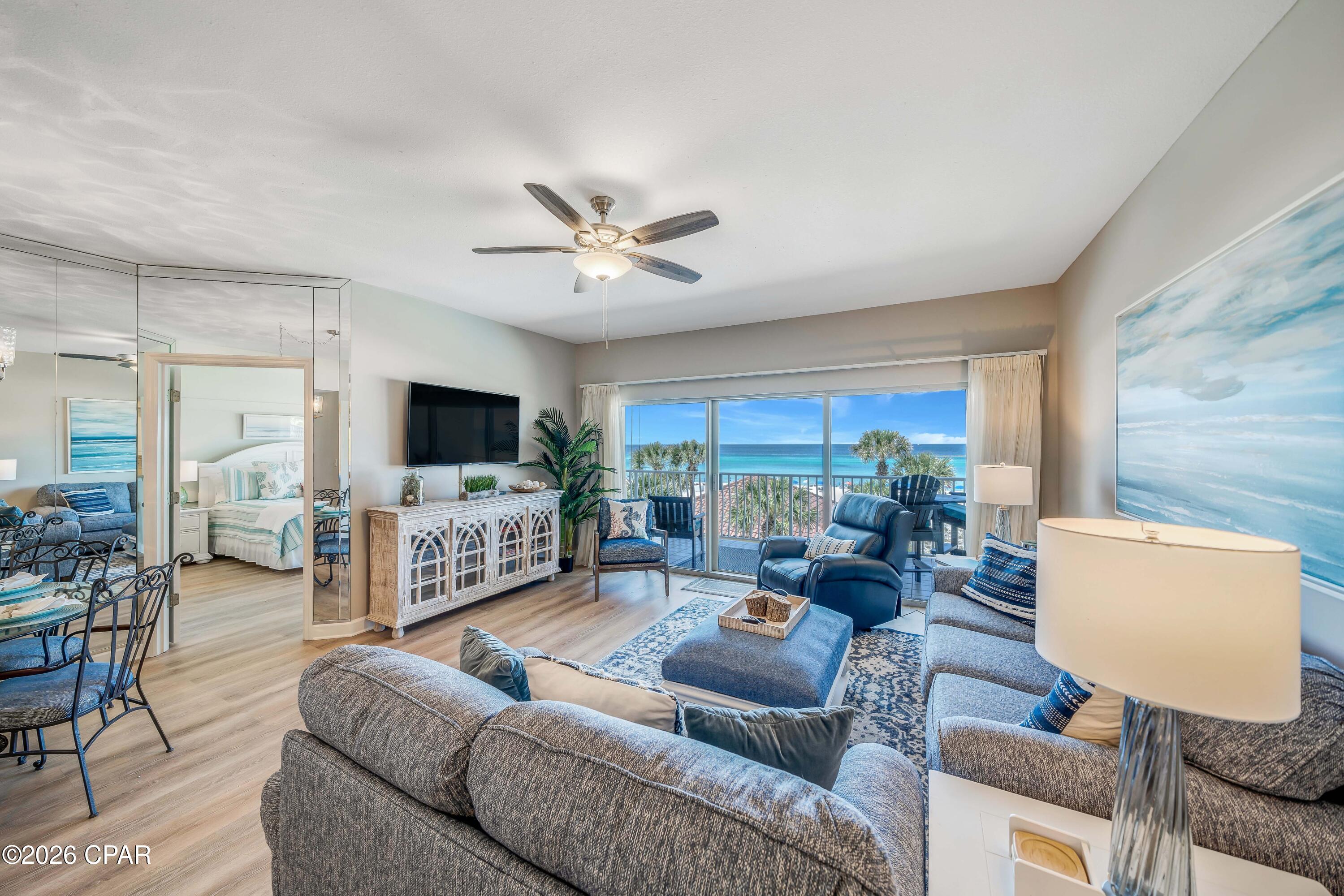 Welcome to your fully renovated, high-income producing, beachfront escape in the highly sought-after Coral Reef Condominiums. Located on the ideal 3rd floor, this beautifully updated 2-bedroom, 2-bath residence offers 1,427 square feet of coastal comfort with stunning Gulf views - perfectly positioned ''not too high, not too low'' for the ultimate beachside experience.

Completely transformed in 2022 with additional upgrades through 2025, including new windows and sliding doors, this turnkey condo blends modern design with effortless functionality. Inside, you'll find luxury vinyl tile flooring throughout, fresh professional paint, updated lighting, and thoughtfully curated furnishings that create a relaxed yet elevated coastal vibe. The kitchen features stainless steel appliances, updated backsplash, and a sleek sink - ideal for both everyday living and entertaining.

The spacious primary suite is a true retreat, highlighted by a custom accent wall and a beautifully renovated bathroom with quartz countertops and an oversized walk-in shower. The guest bedroom comfortably accommodates visitors with two queen beds, while the second bathroom has been stylishly updated with subway tile and a new vanity.

Step out onto your private balcony and unwind as you take in breathtaking views of the Gulf - with beach chairs on the white sandy beach that have been paid for through October 31st, 2026. This unit is being offered fully furnished, including a new 65'' Sony TV (2025), premium Flexsteel sofa / loveseat with heat and massage functions, and durable Polywood balcony furniture.

Additional conveniences include a full-size washer and dryer, updated smoke detectors and sprinkler heads (2025).

Coral Reef is a low-density, Gulf-front community known for its peaceful setting on the quieter east end of Panama City Beach. Residents and guests enjoy resort-style amenities including two beachfront pools (one seasonally heated), direct beach access, a fitness center, owner's lounge, and fully renovated lobby. You're also just minutes from local dining, shopping, and the natural beauty of St. Andrews State Park.

Whether you're searching for a second home, full-time residence, or income-producing property, this move-in-ready coastal retreat checks every box. Just bring your suitcase -- everything else is already here.