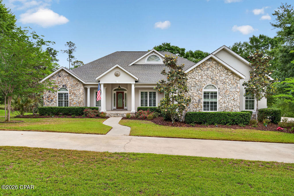 Located in the sought-after Pine Bluff area, this beautifully maintained 4-bedroom, 3-bathroom stucco home offers a perfect combination of style, space, and thoughtful design. From the moment you step inside, you'll appreciate the inviting layout featuring a spacious living area that flows seamlessly into a formal dining space--ideal for both everyday living and entertaining.

The interior showcases a variety of upscale finishes, including tray ceilings, elegant wainscoting, granite countertops, hardwood flooring, and tile accents throughout. Every detail has been carefully selected to create a warm yet refined atmosphere.

Outdoors, the home continues to impress with a screened-in porch overlooking a sparkling in-ground pool, creating the perfect settLocated in the sought-after Pine Bluff area, this beautifully maintained 4-bedroom, 3-bathroom stucco home offers a perfect combination of style, space, and thoughtful design. Situated on one of the few lots in the neighborhood with desirable street-to-street access, the property features entrances from both sides--providing added convenience, flexibility, and enhanced accessibility.

From the moment you step inside, you'll appreciate the inviting layout featuring a spacious living area that flows seamlessly into a formal dining space--ideal for both everyday living and entertaining. The interior showcases a variety of upscale finishes, including tray ceilings, elegant wainscoting, granite countertops, hardwood flooring, and tile accents throughout, creating a warm yet refined atmosphere.

Step outside to enjoy your own private retreat, complete with a screened-in porch overlooking a sparkling in-ground pool. The pool area is enclosed with classic black wrought iron fencing, and a covered gazebo offers the perfect place to unwind or host guests. Completing the property is a 2-car detached garage, conveniently positioned at the rear and easily accessible thanks to the dual-entry lot. This home is a rare find, offering both luxury and functionality in one of the area's most desirable locations.ing for relaxing or hosting guests. The pool area is fully enclosed with black wrought iron fencing, and a covered gazebo adds an extra touch of charm and functionality. Completing the property is a convenient 2-car detached garage, tucked at the rear of the home for easy access. This property offers a wonderful opportunity to enjoy comfortable, well-appointed living in a highly desirable location.